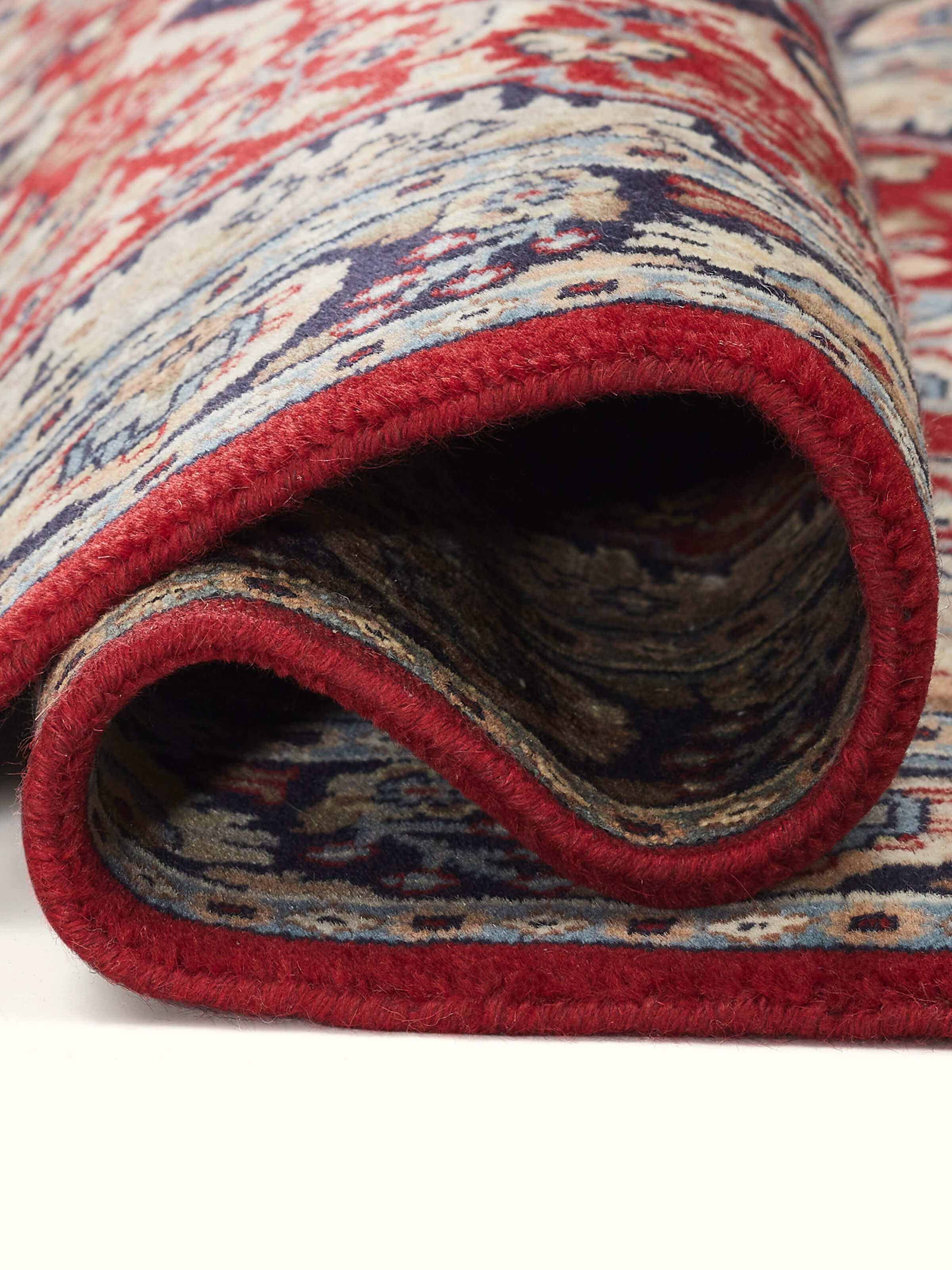 Close-up of the carpet fibers and knotting detail, showing quality and texture