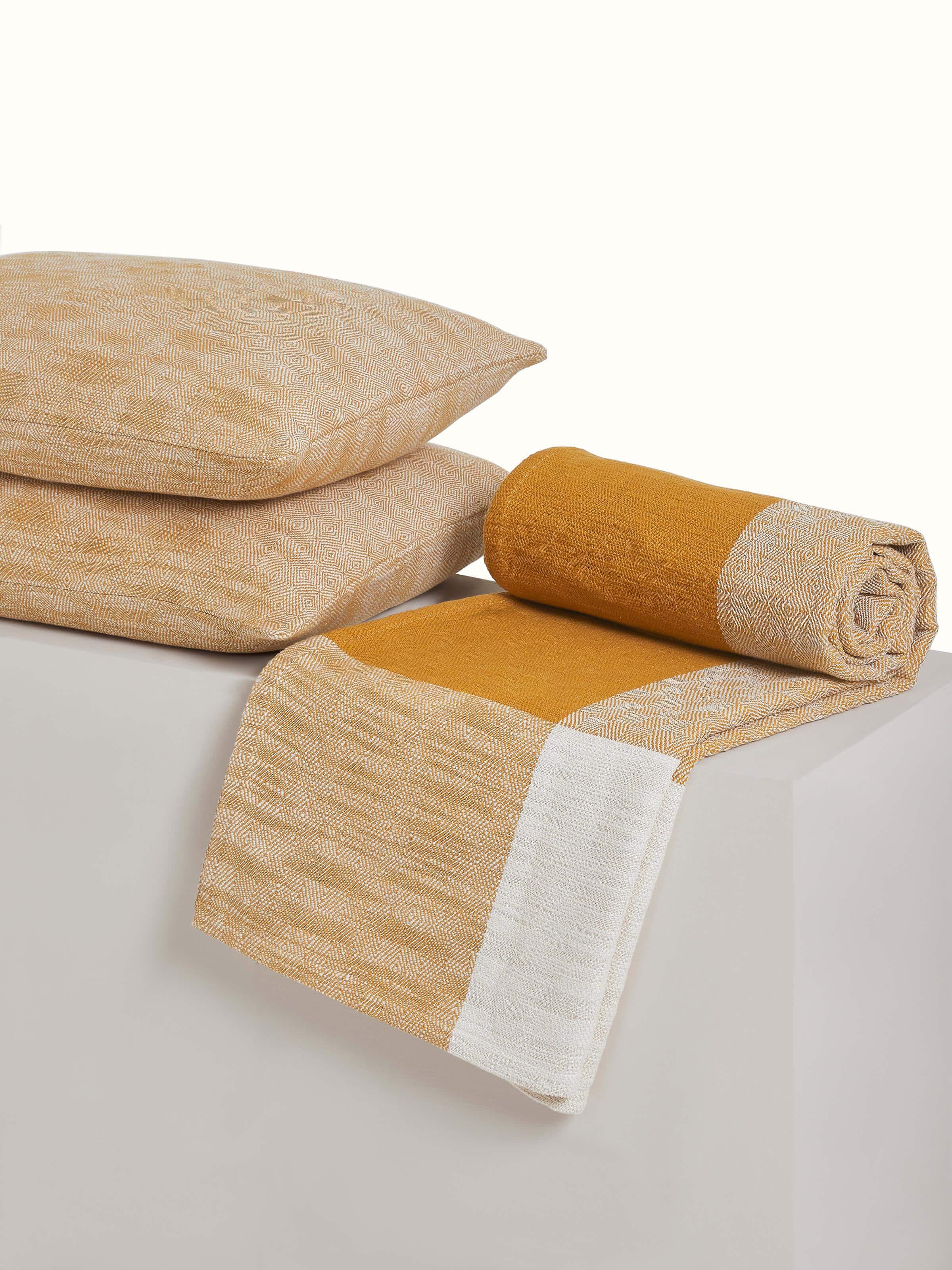 Back view: Rear angle of bedspread showing clean drape and soft corner folds.