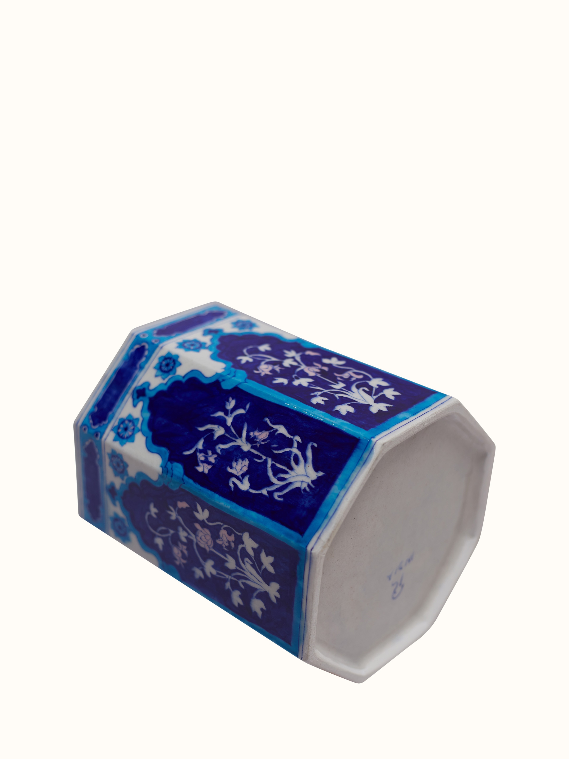 Back view of blue pottery baari ceramic planter showing rear finish