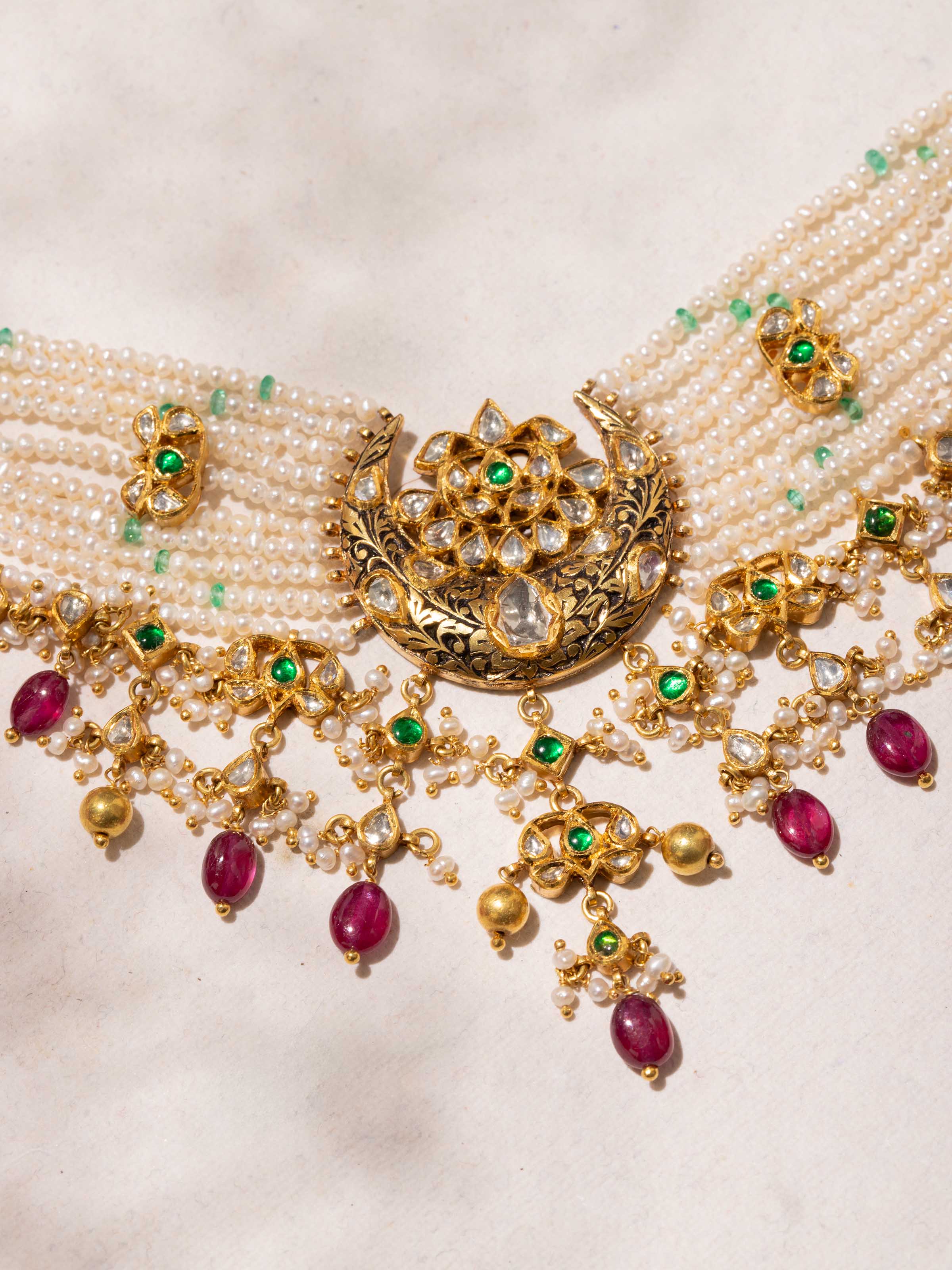 Close-up of craftsmanship on Partash 18 karat gold choker