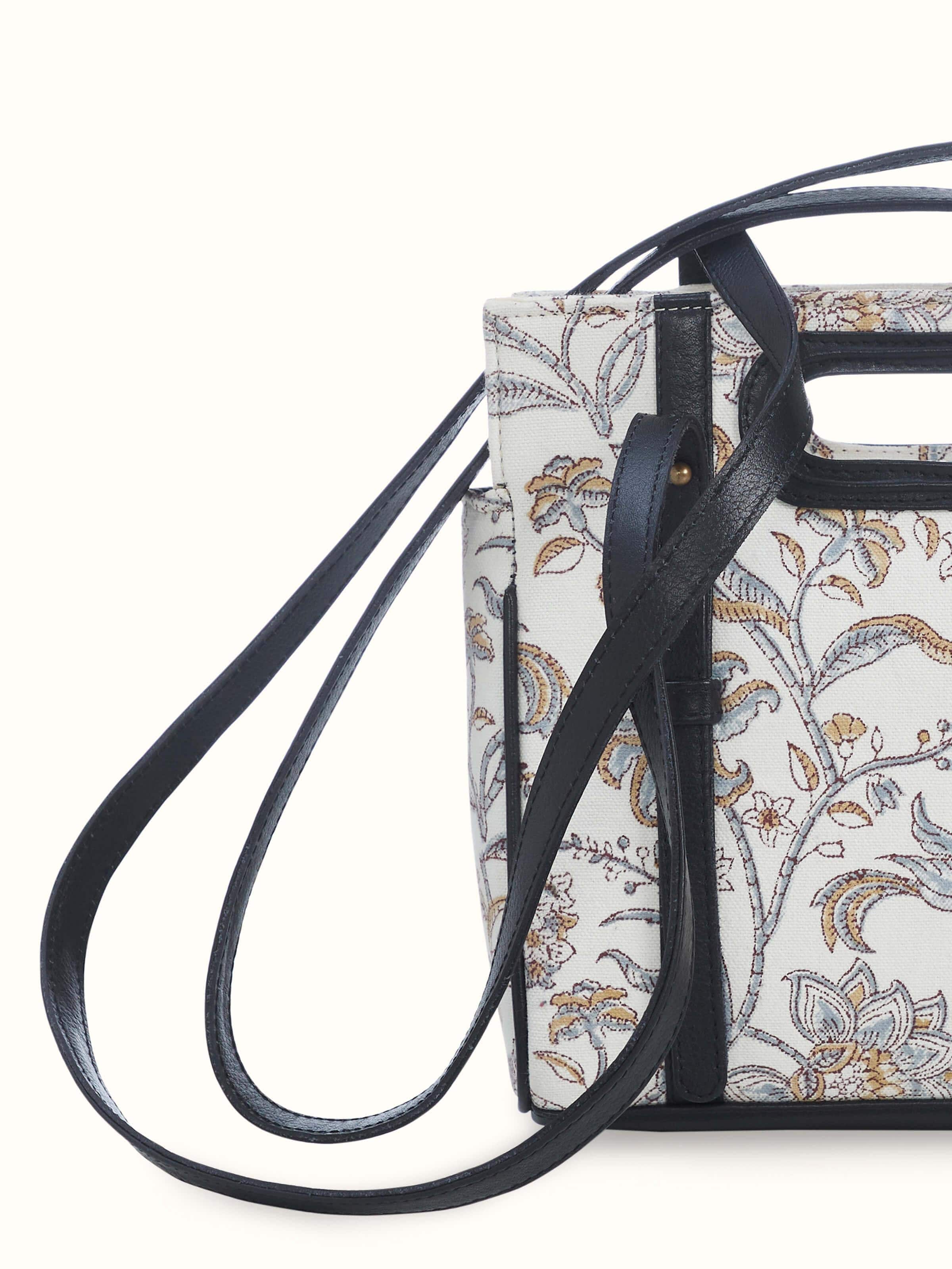 Top view showing interior compartments and secure zipper closure.