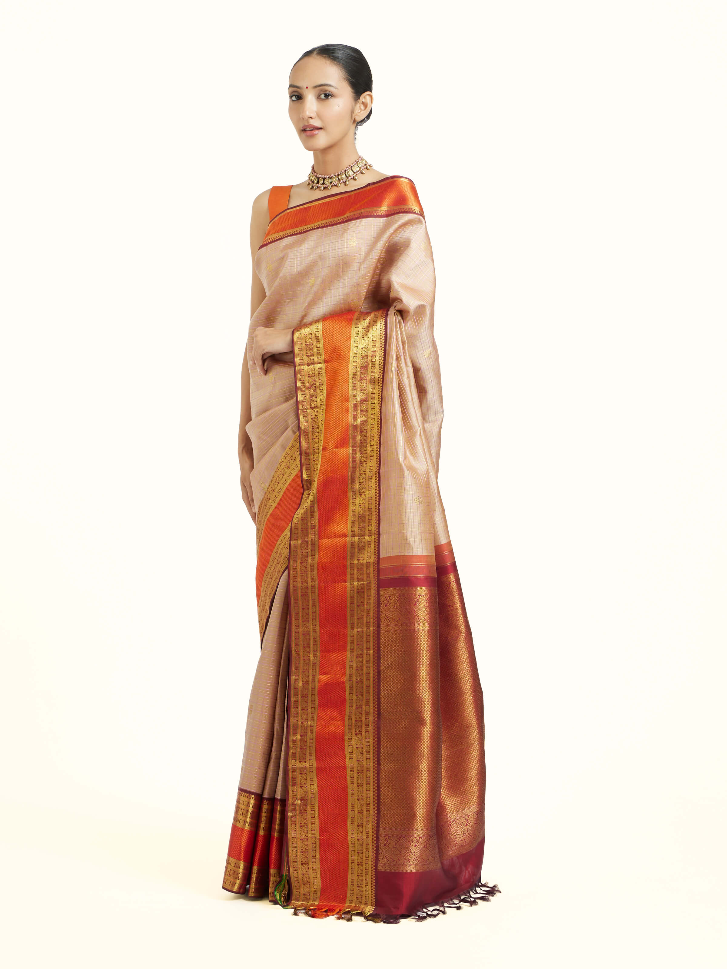 Side view of biscuit silk Kancheepuram saree showcasing silk sheen