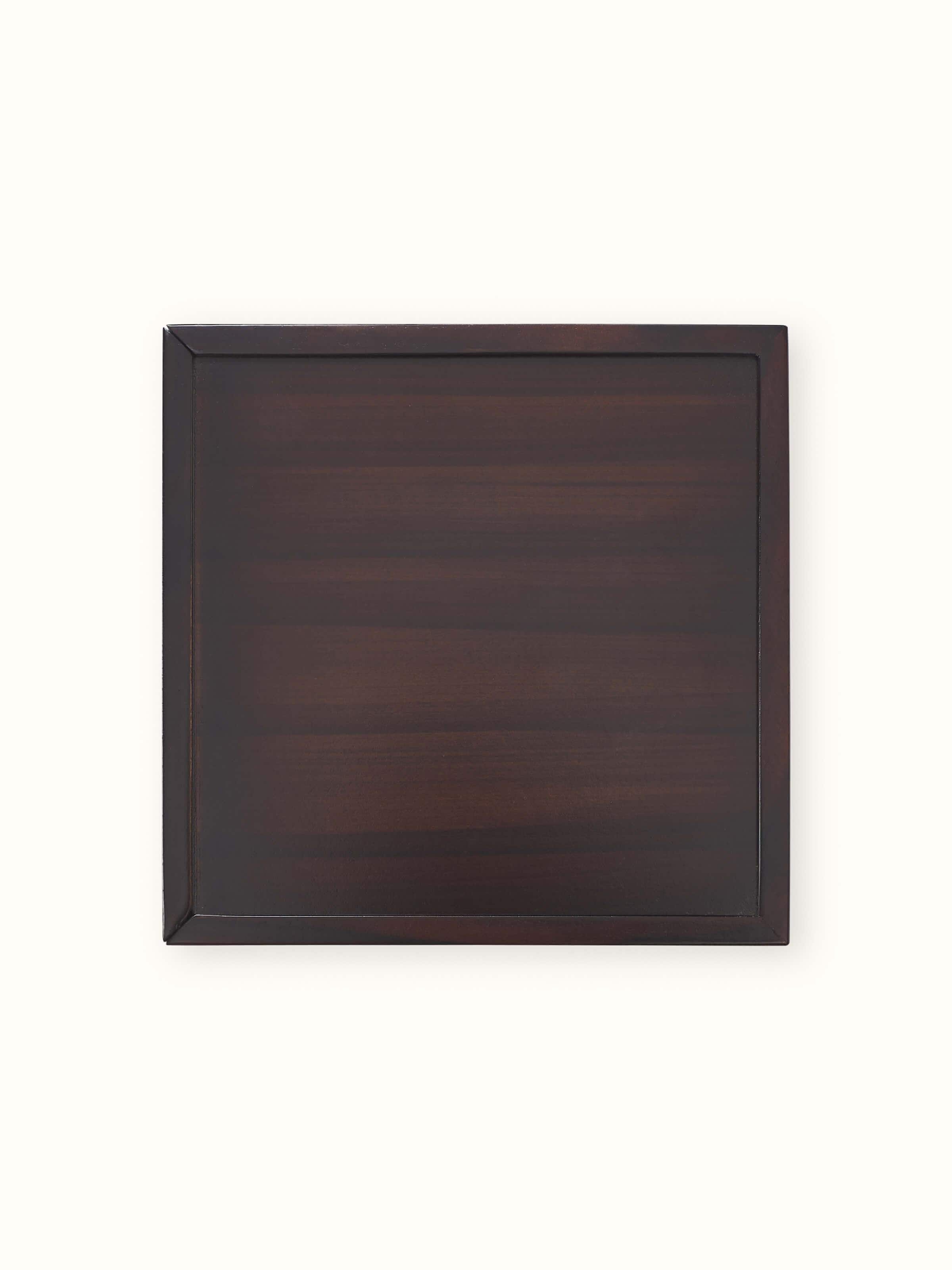 Close-up of Tarkashi Construction Block Game with blocks stacked in a creative design