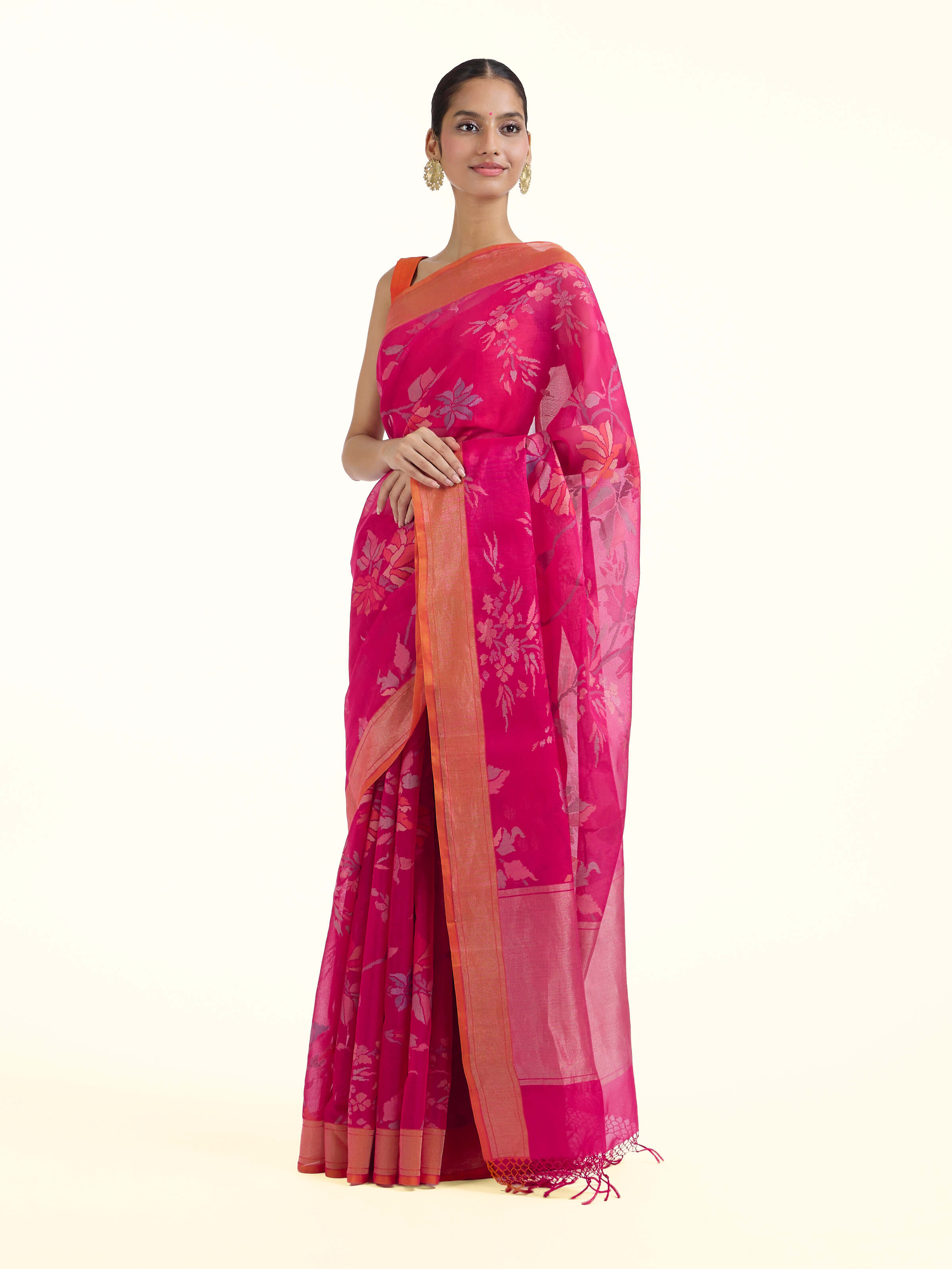 Side view of pink cotton Awadh Jamdani saree with airy drape and contrast border