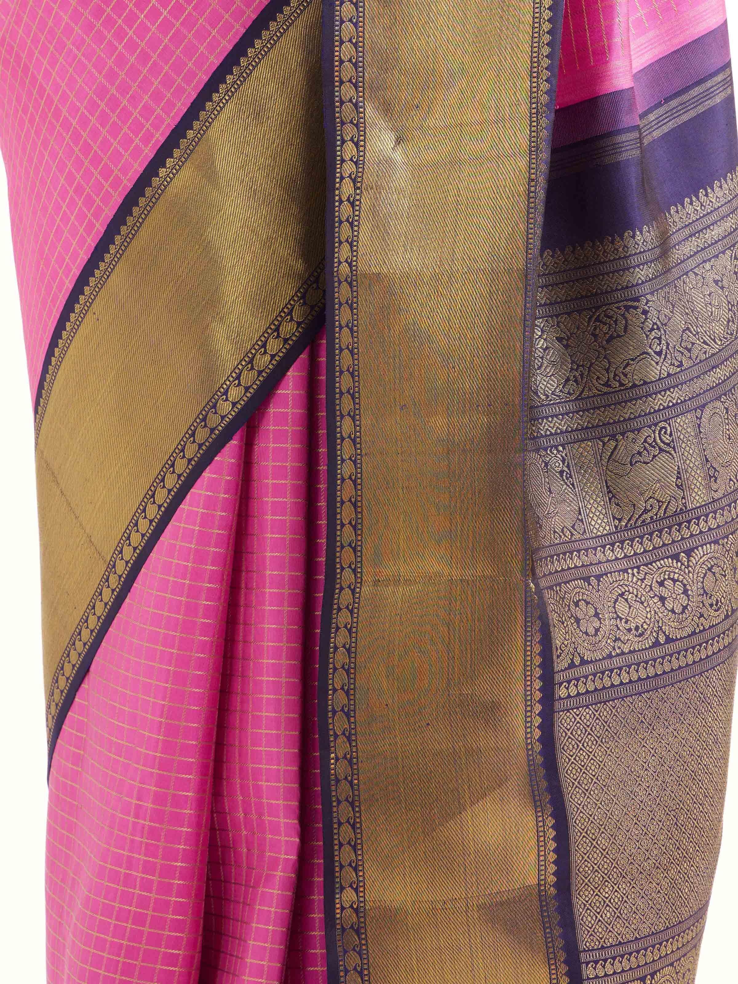 Detail view of mauve silk Kancheepuram saree showing silk texture and zari craftsmanship