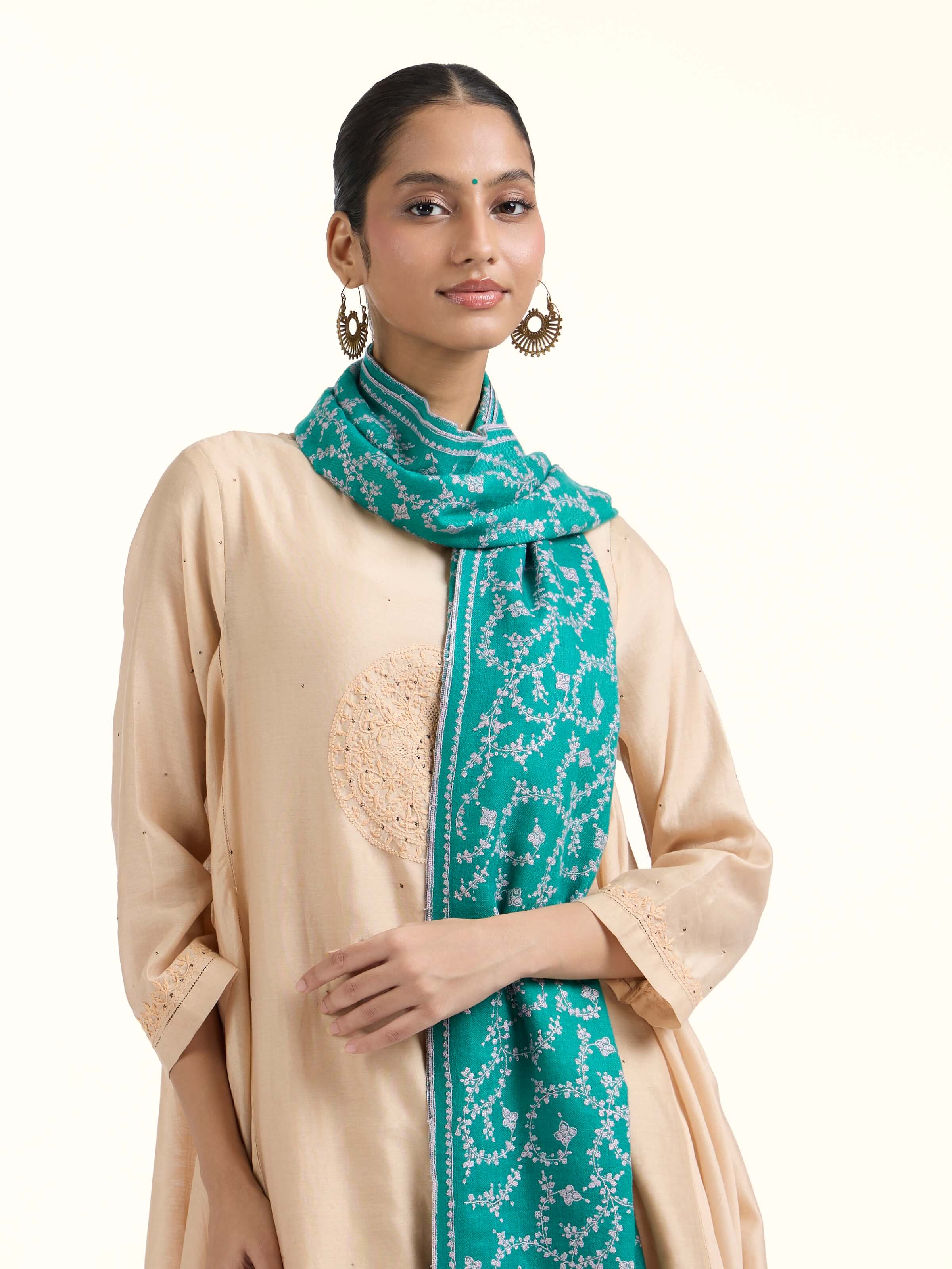 Angled view of Wahida pashmina sozni embroidered stole highlighting fine sozni work