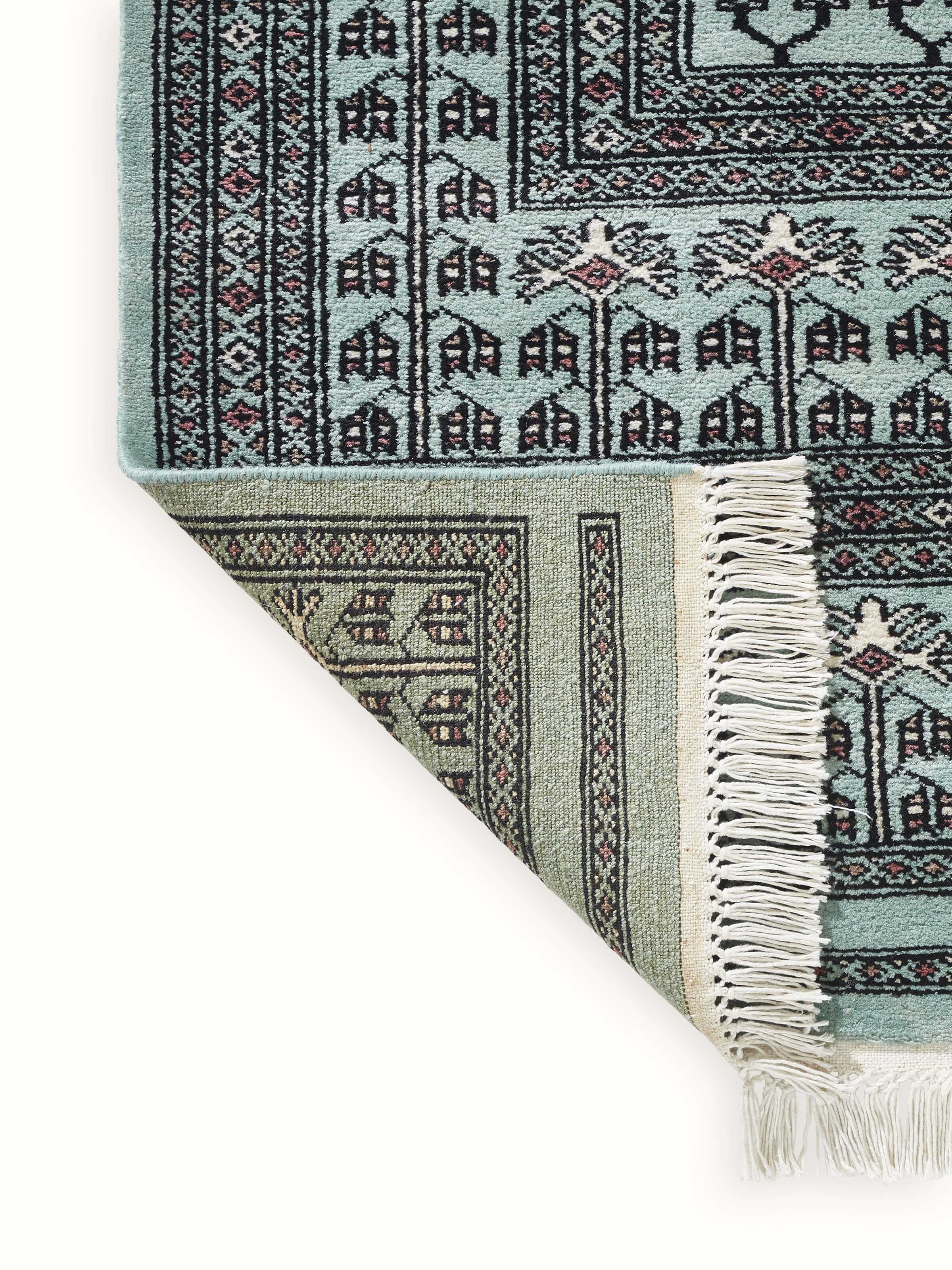 Backside of Parda blue Gwalior wool carpet showing weave structure