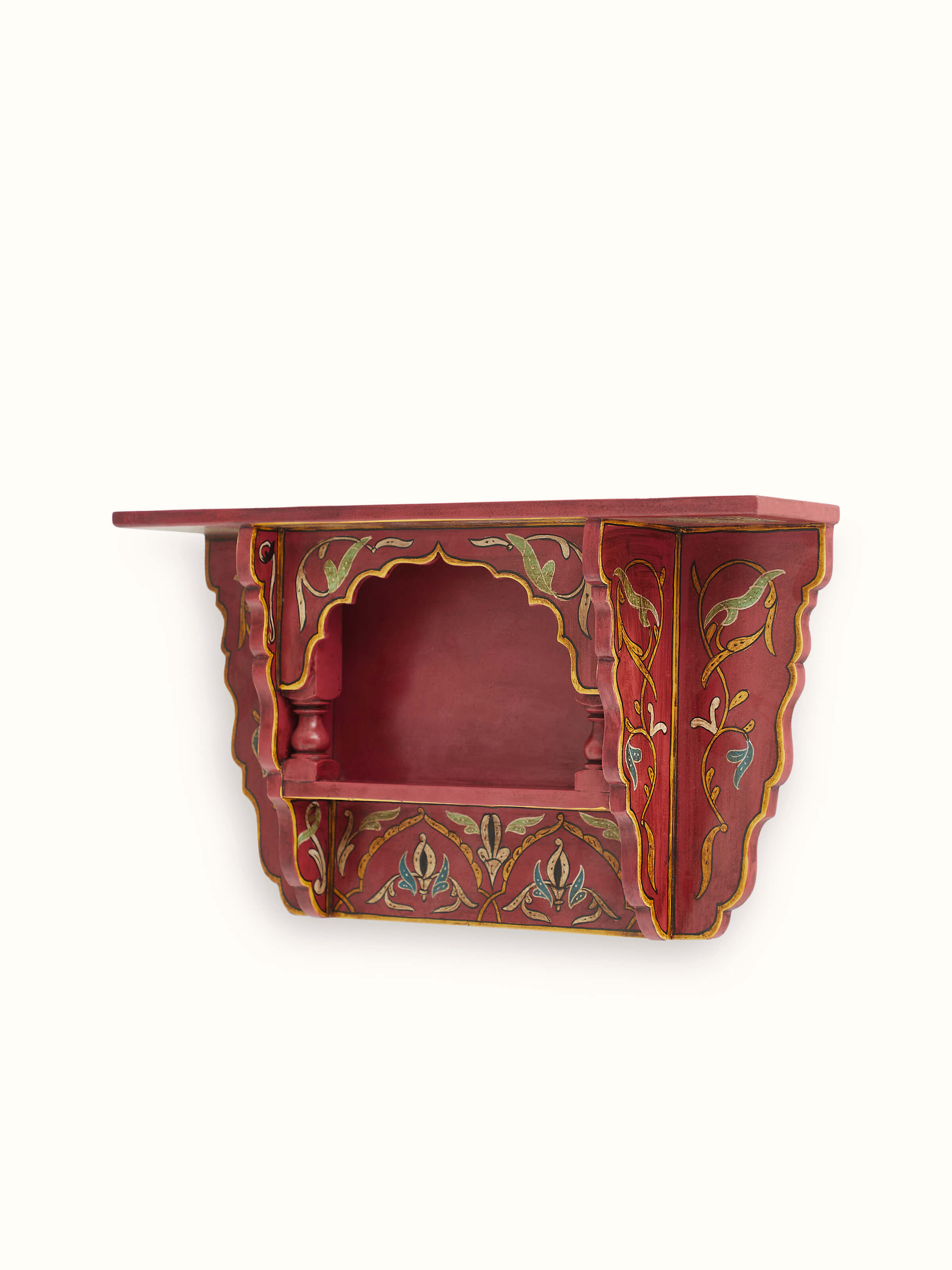 Angled view of Swadesh Red Miniature Painted Wall Shelf highlighting its compact design and detailed painting