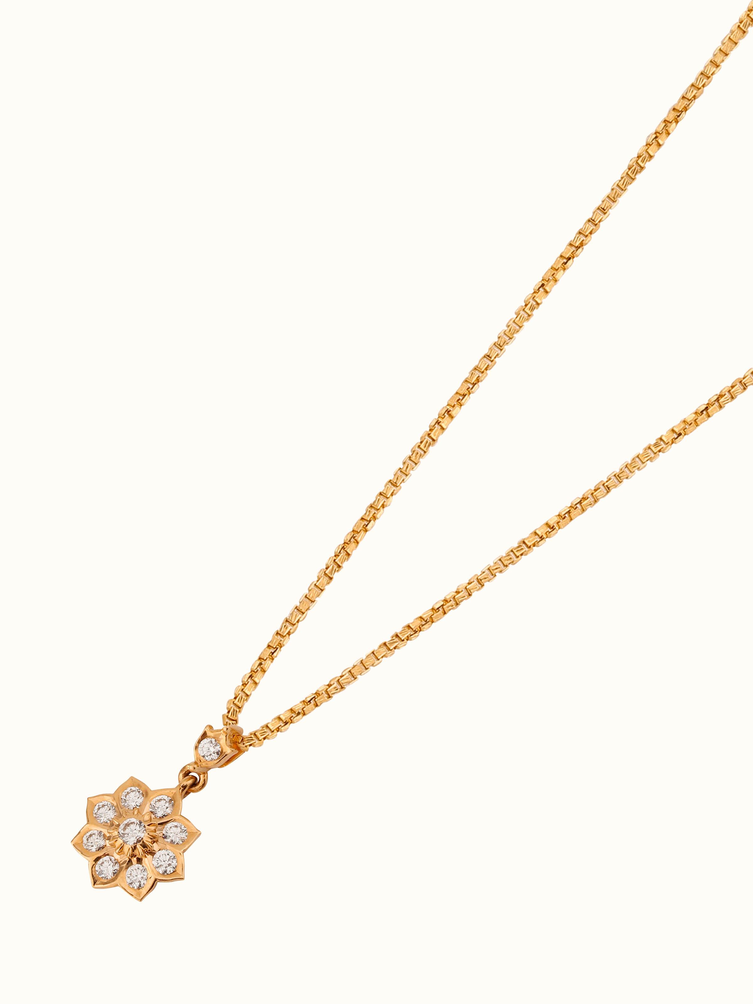 Side view of Close-setting 22 Karat Gold Pendant & Chain by Swadesh showing the fine gold chain and intricate pendant