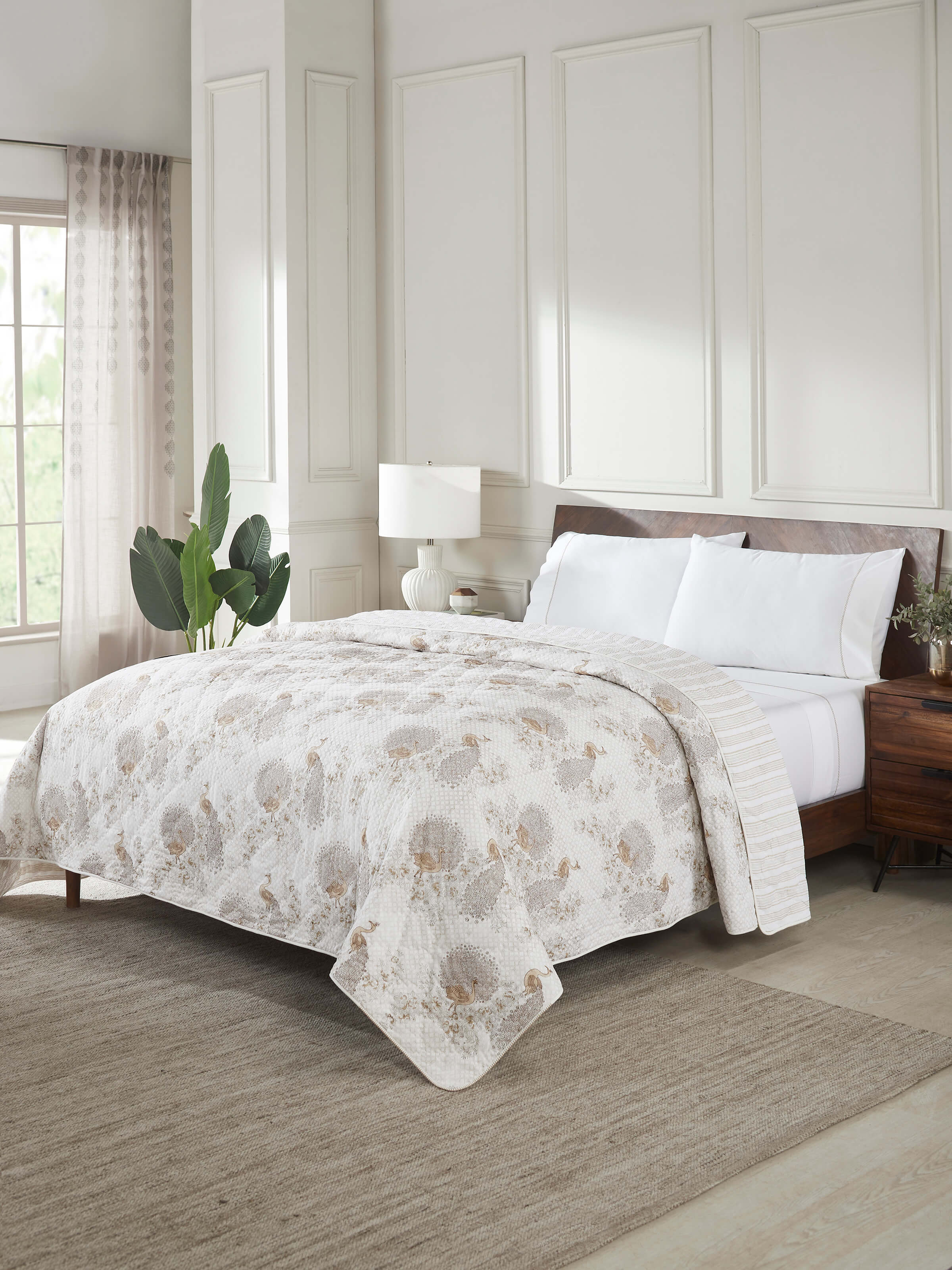 Close-up of Shivranjini beige floral cotton Sanganeri block printed double quilt