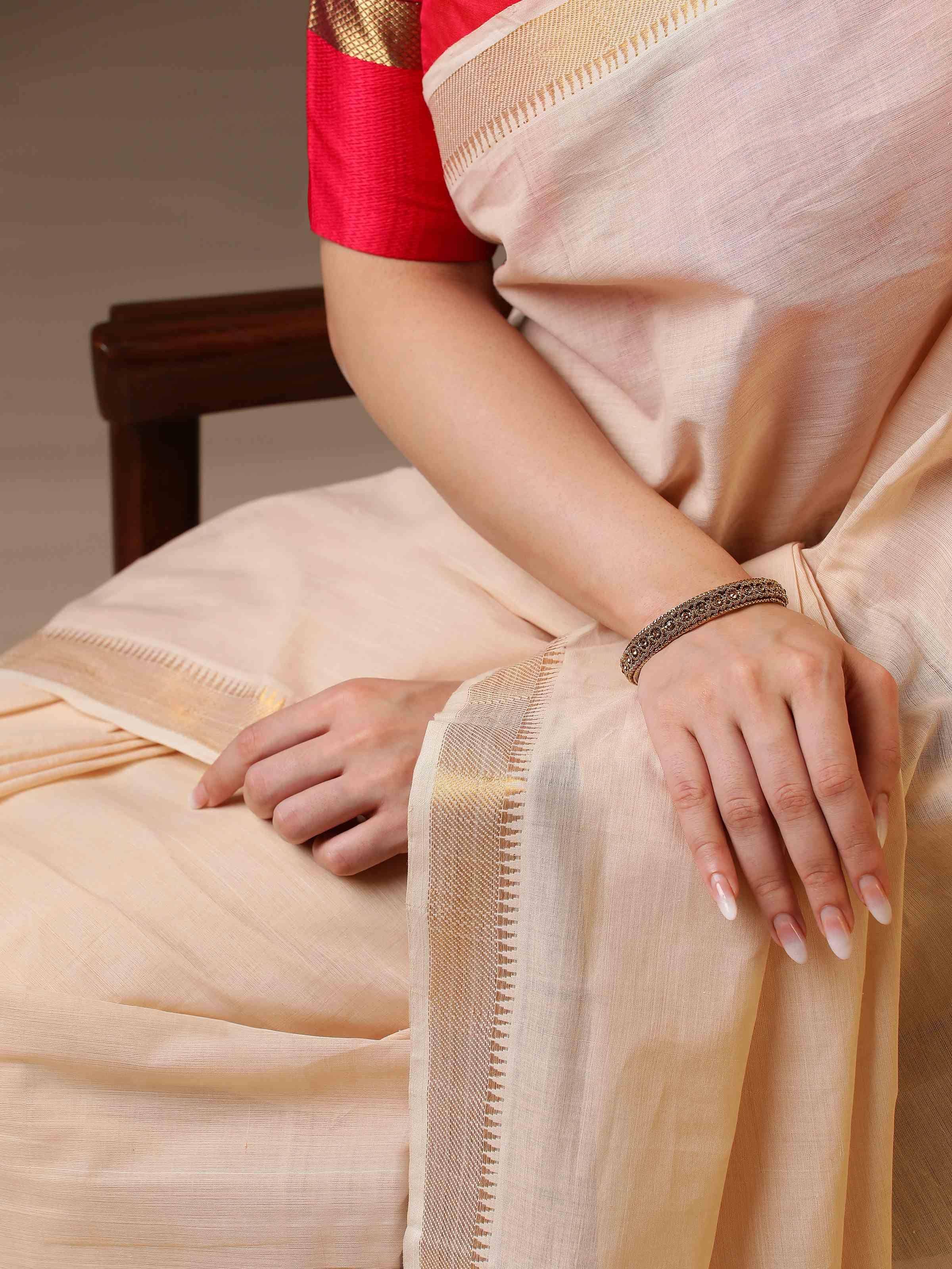 Close-up detail of saree weave blending gossamer softness with cotton durability
