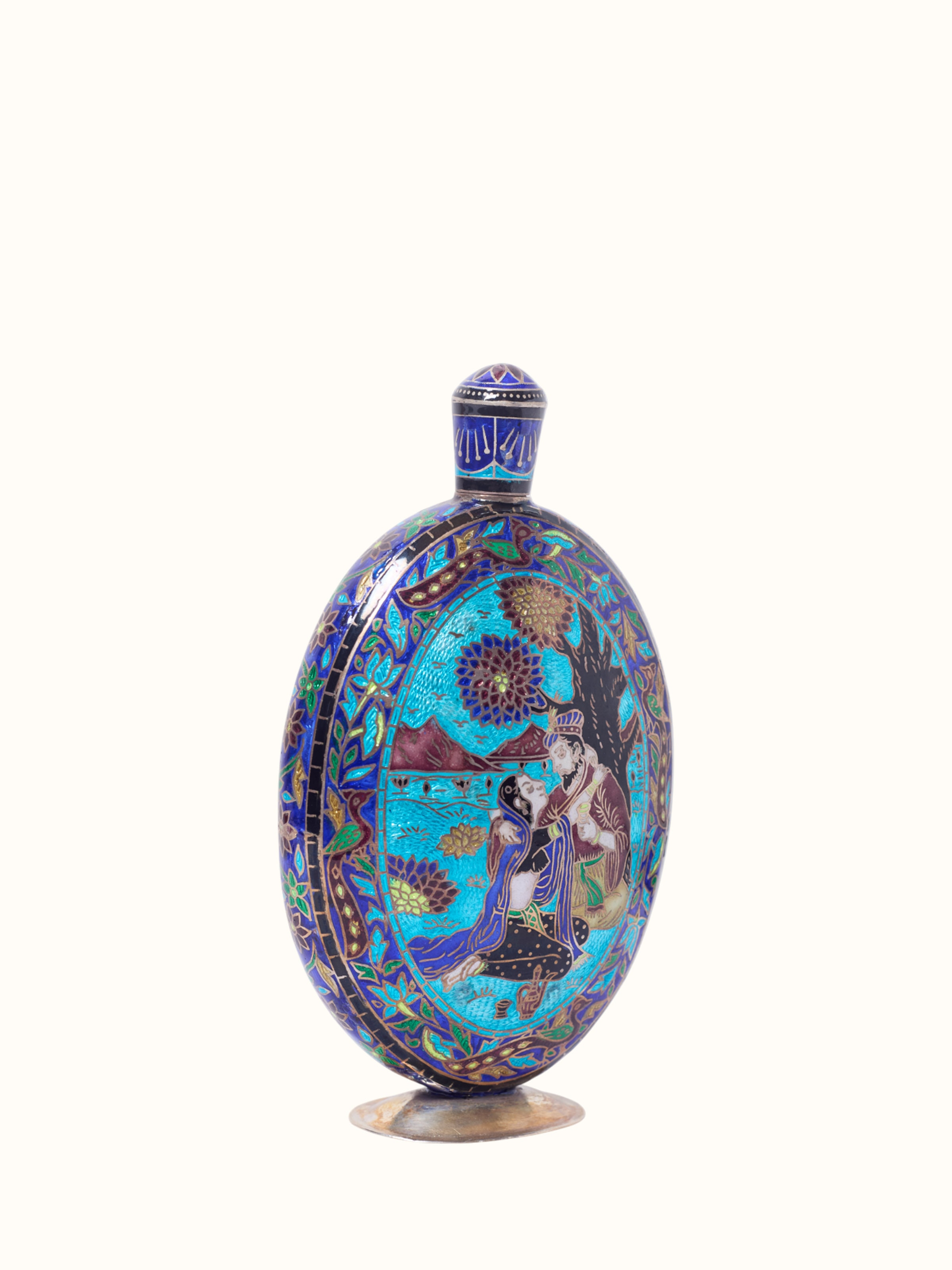 angled view of enamelled high gloss silver flask