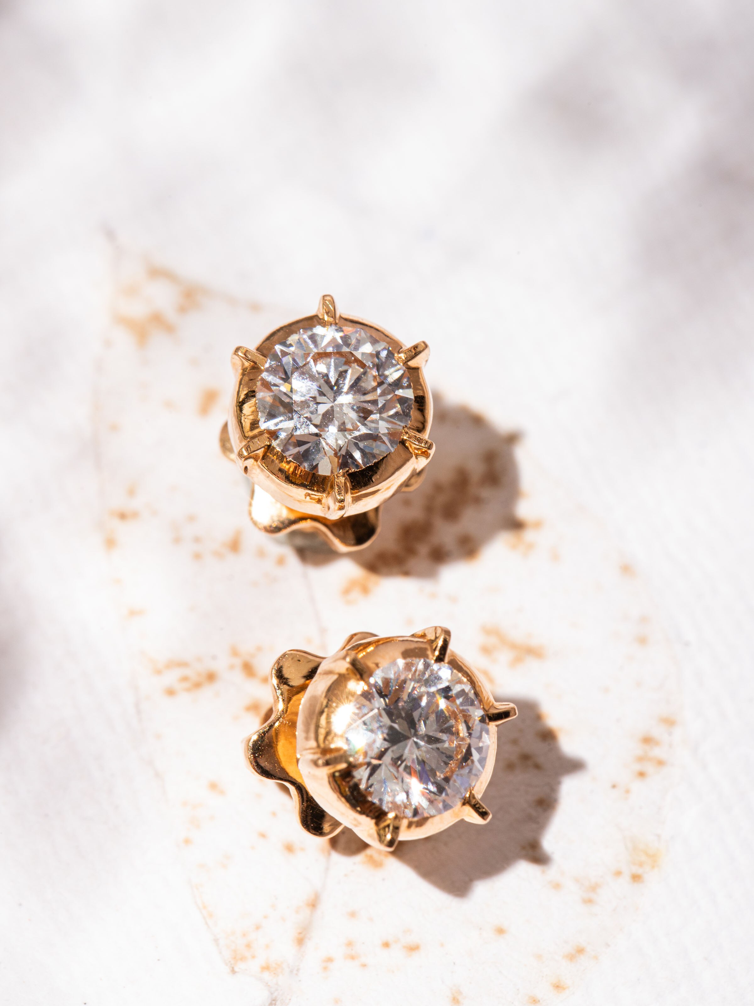 Artistic overhead shot focusing on the studs’ texture and shine