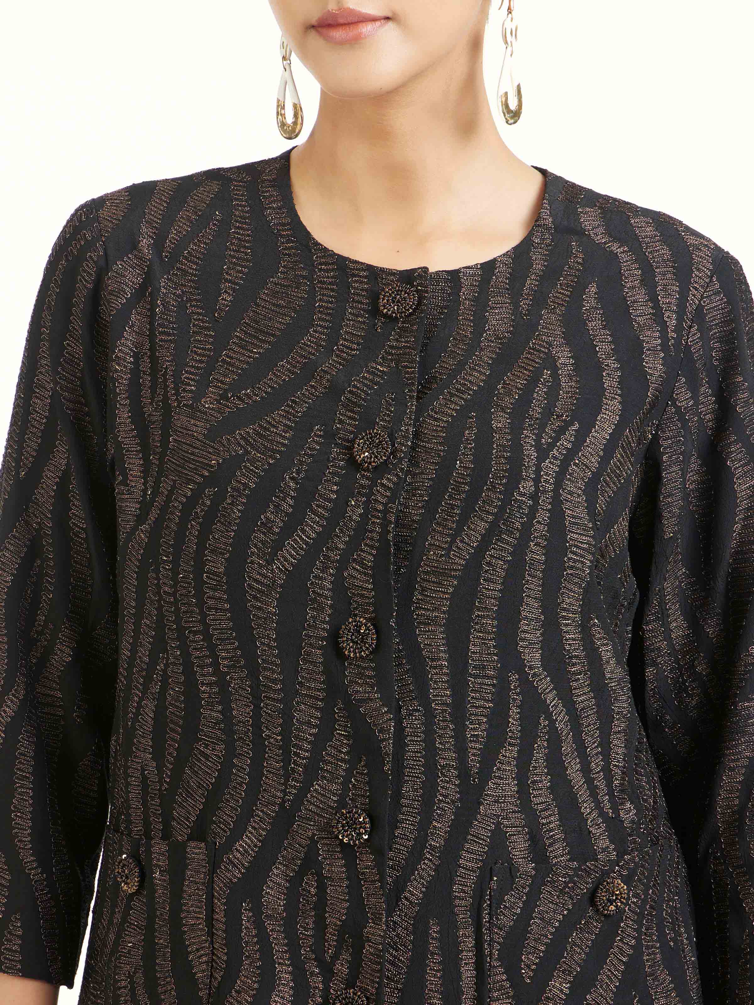 Detail view of black aari hand embroidered jacket showcasing fine embroidery craftsmanship