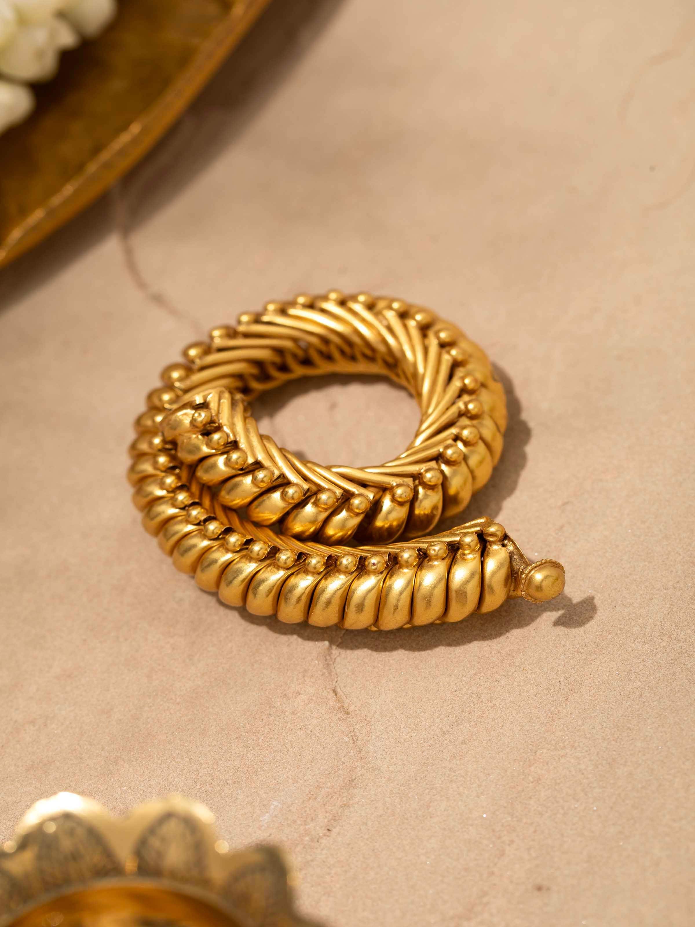 Detailed view of Smithing Bangle focusing on the craftsmanship and intricate metalwork