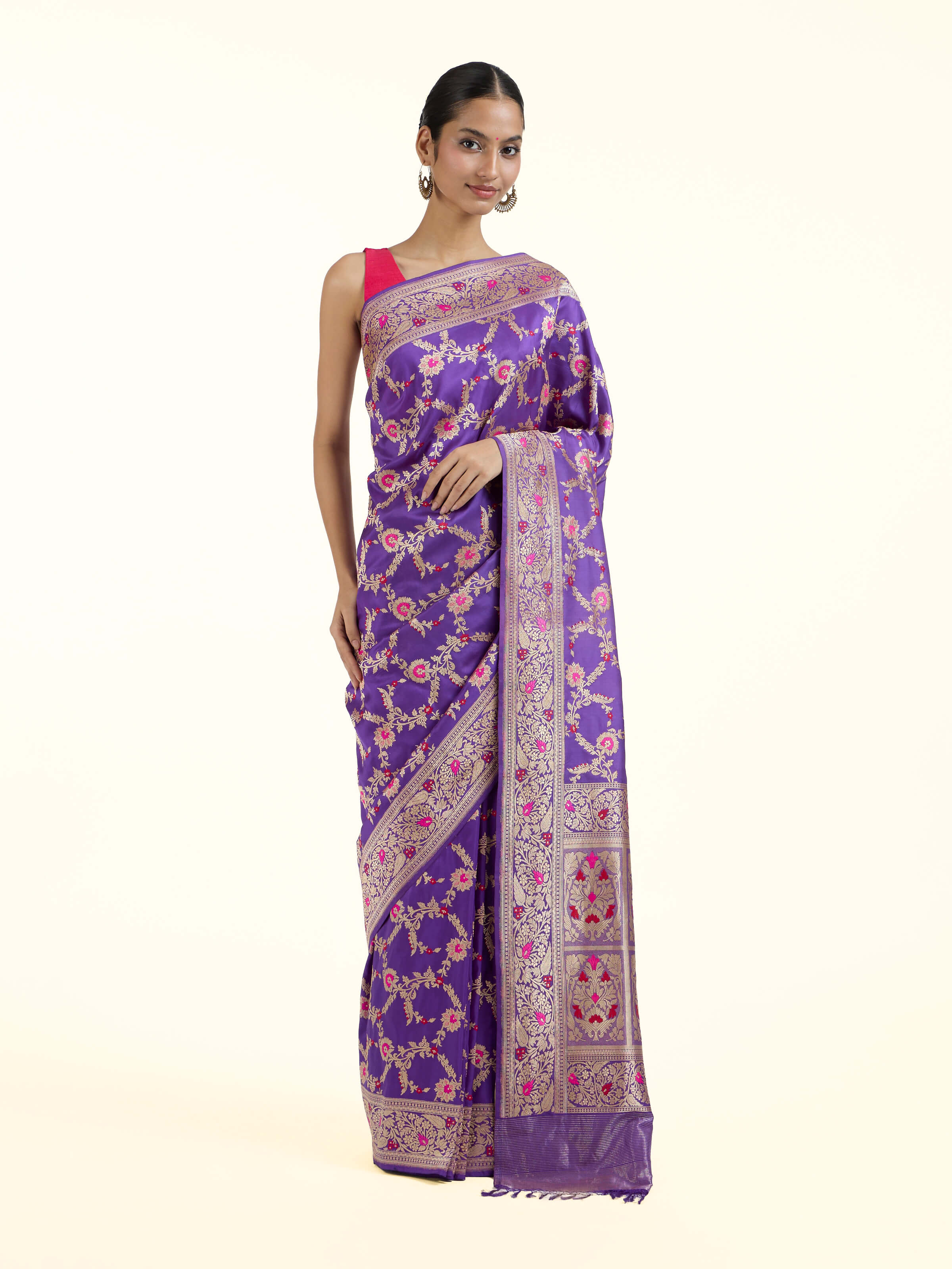 Front view of purple mulberry katan silk Banarasi saree with rich zari motifs