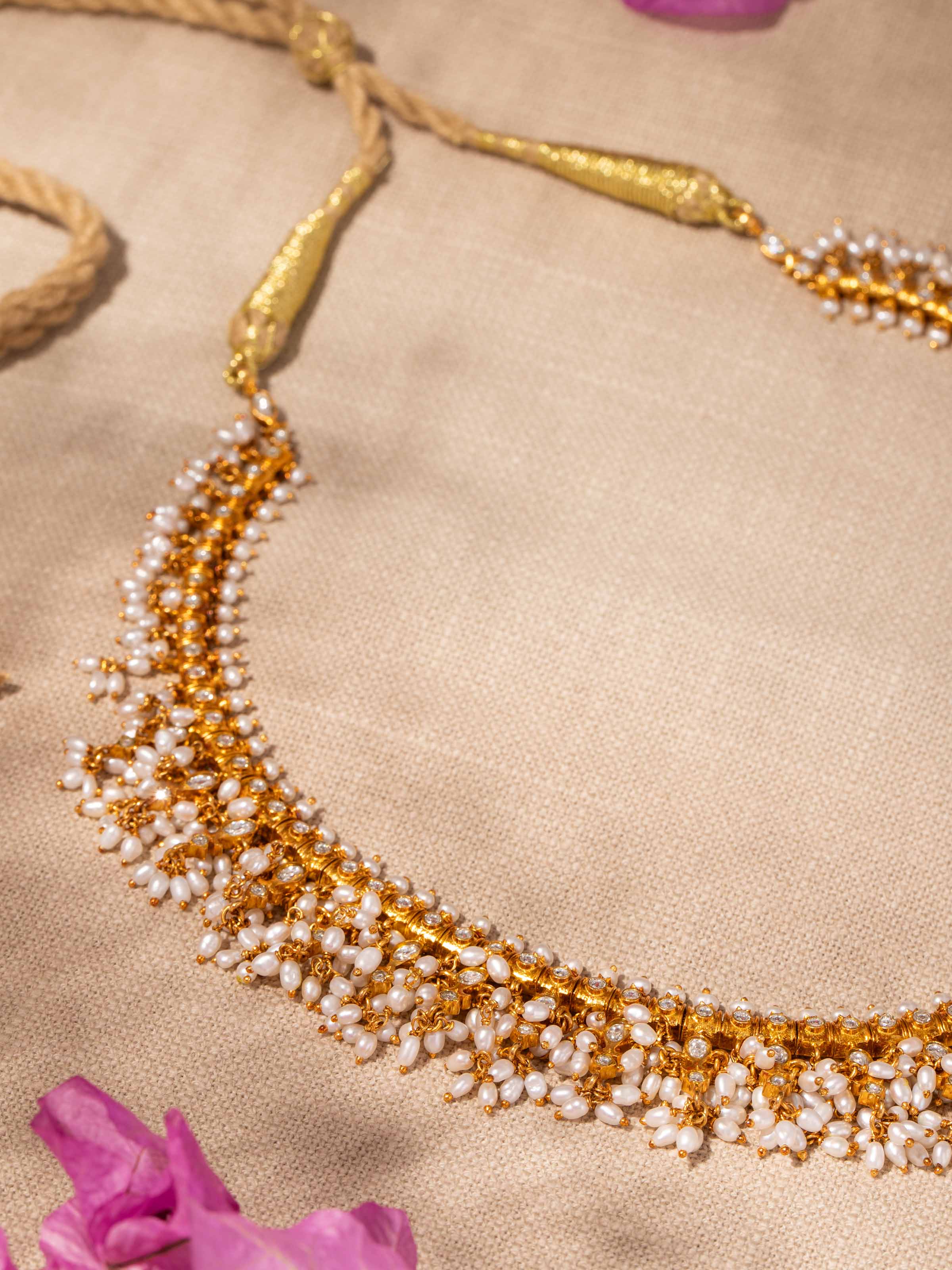 Alternate lifestyle view showcasing Guttapusalu silver collar necklace on model.