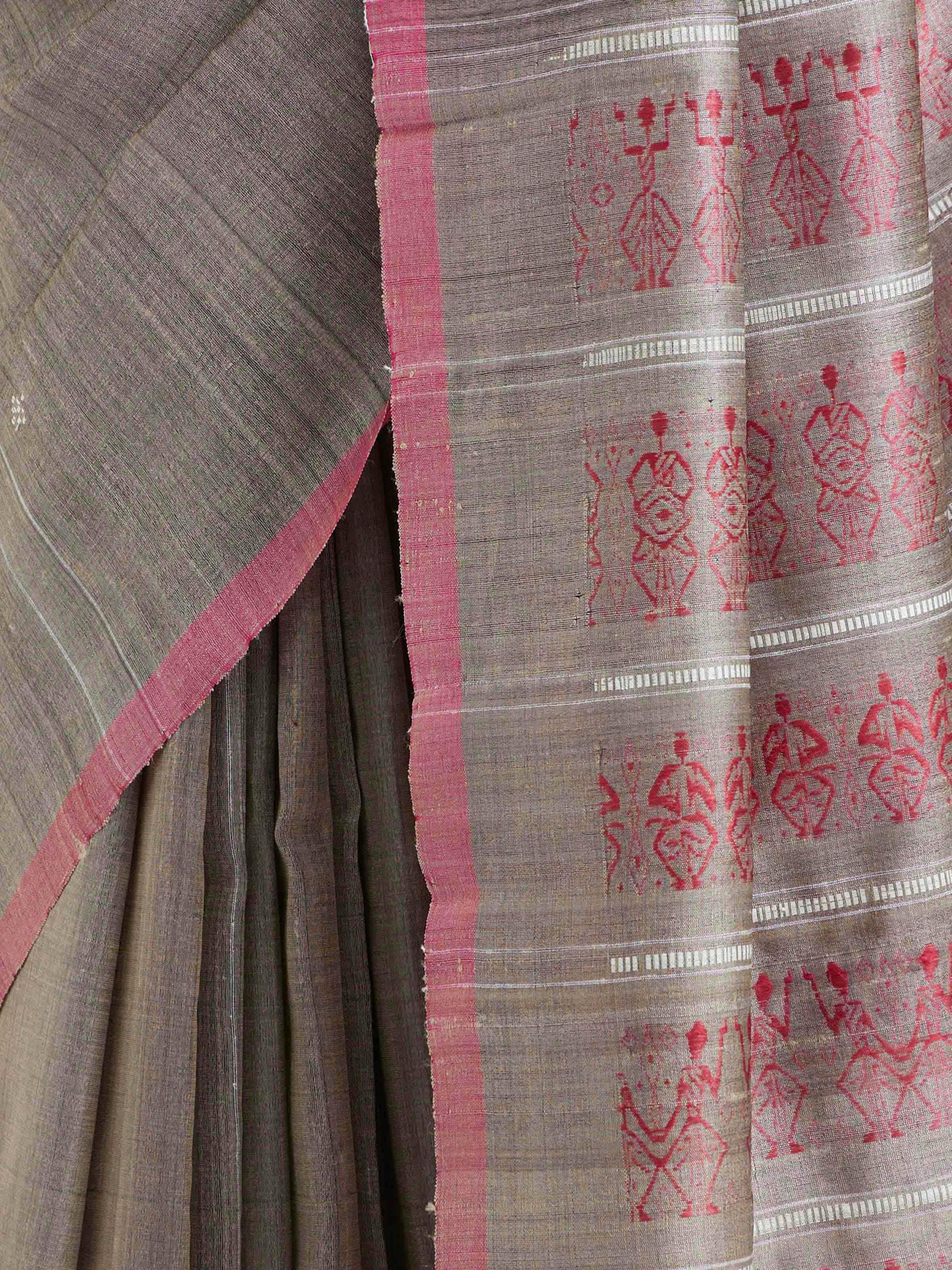 Detail view of beige tussar silk Odisha ikat saree showing tussar silk craftsmanship