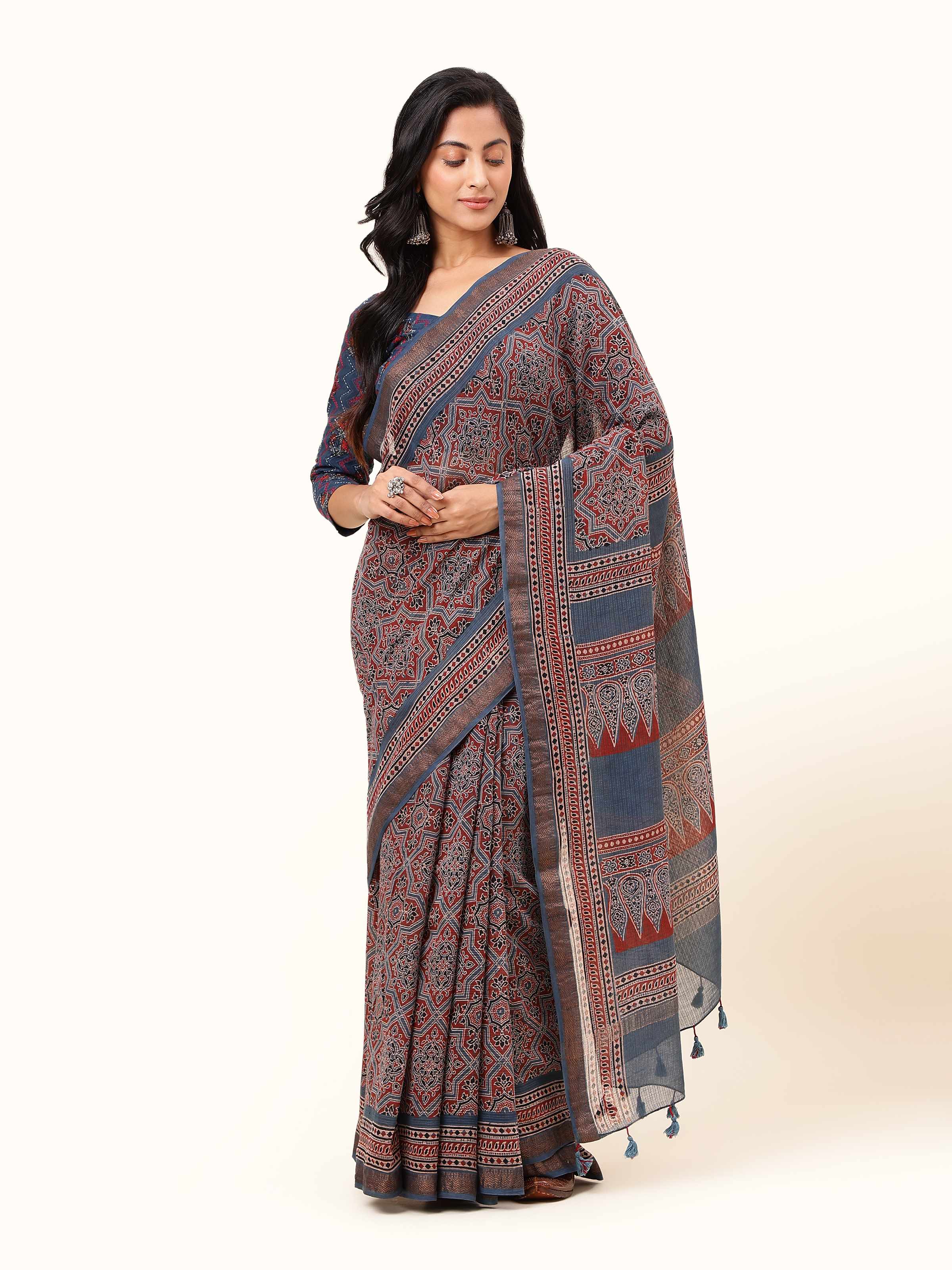 Front view of blue Maheshwari Ajrakh block printed saree with traditional geometric patterns.