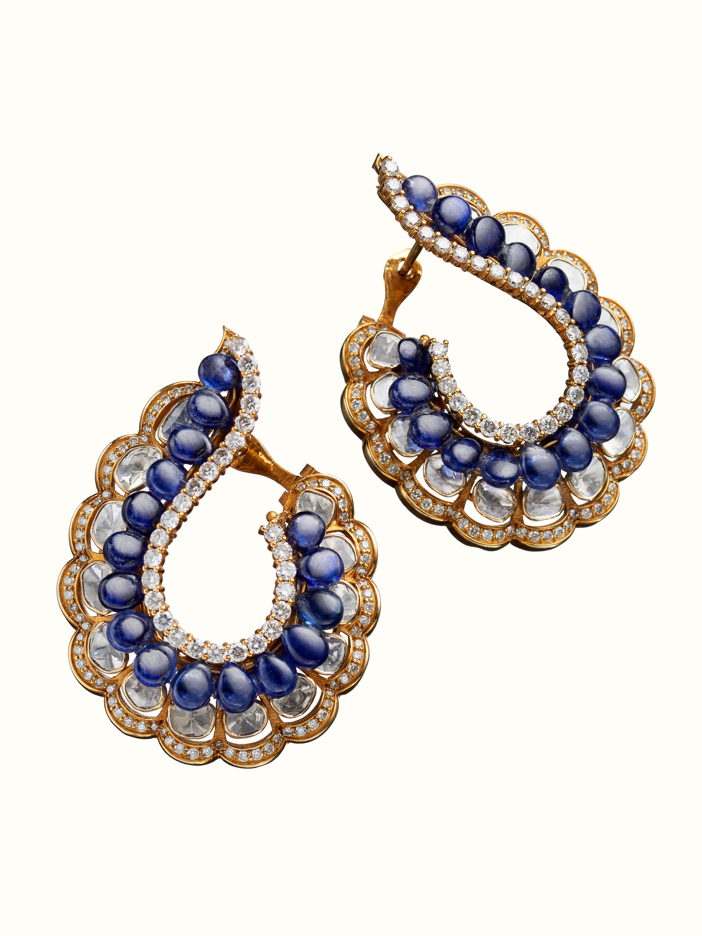 angled view of dank polki 14 karat gold hoop earrings