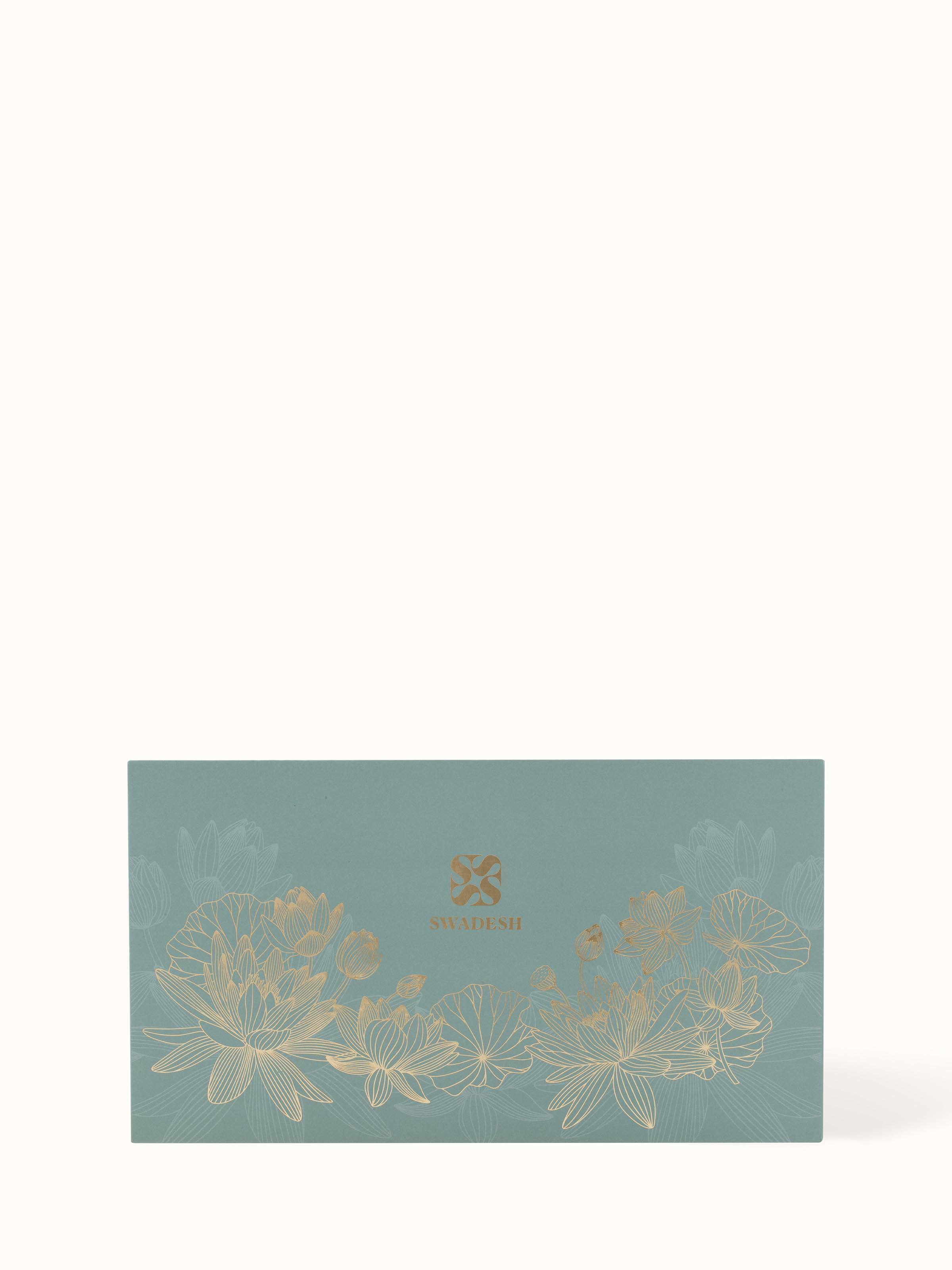 Detailed view of Neroli brass candles (set of 2) showing their sophisticated texture and luxurious appeal.