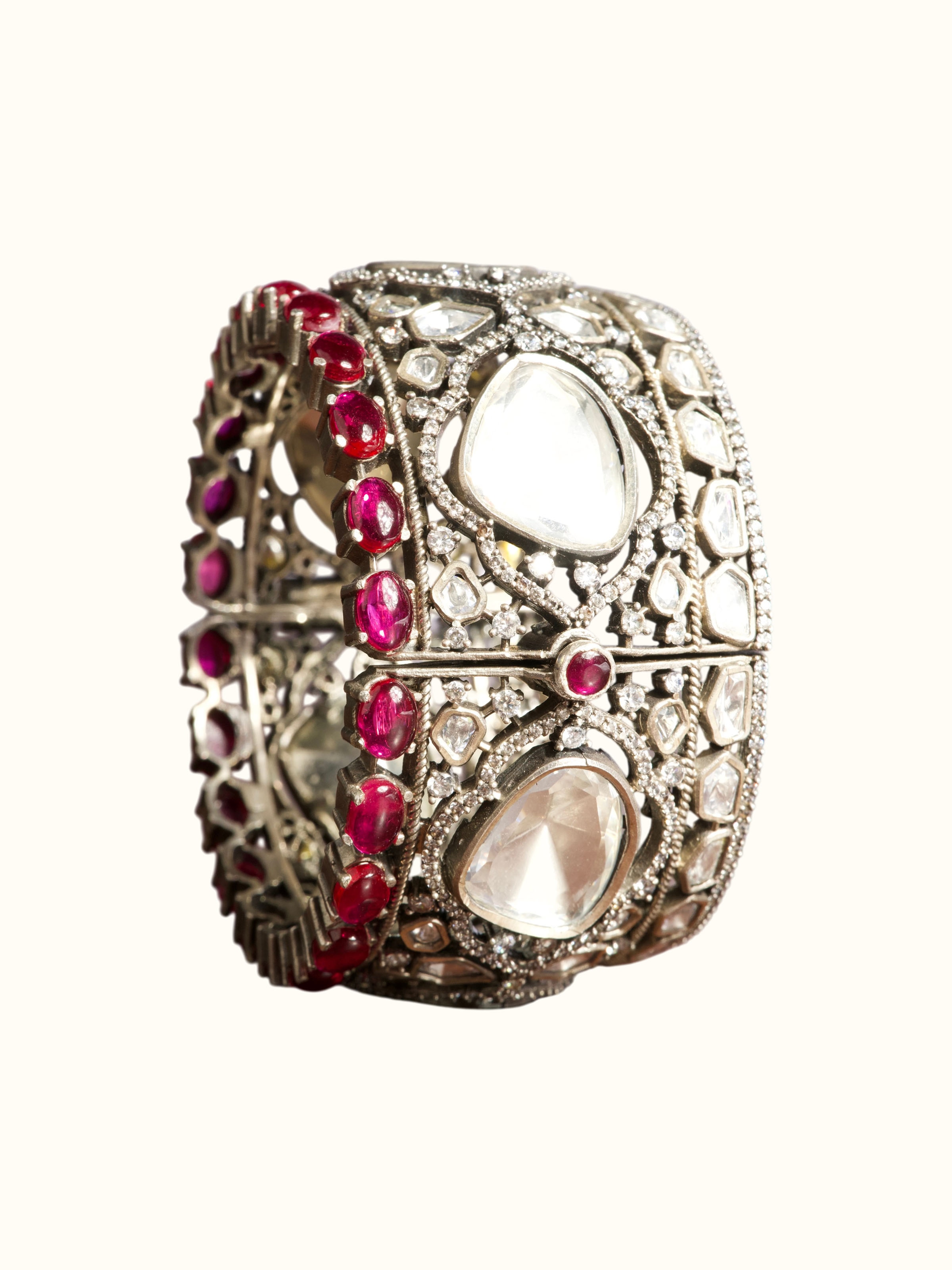 front view of dank polki silver bangle with traditional stone setting