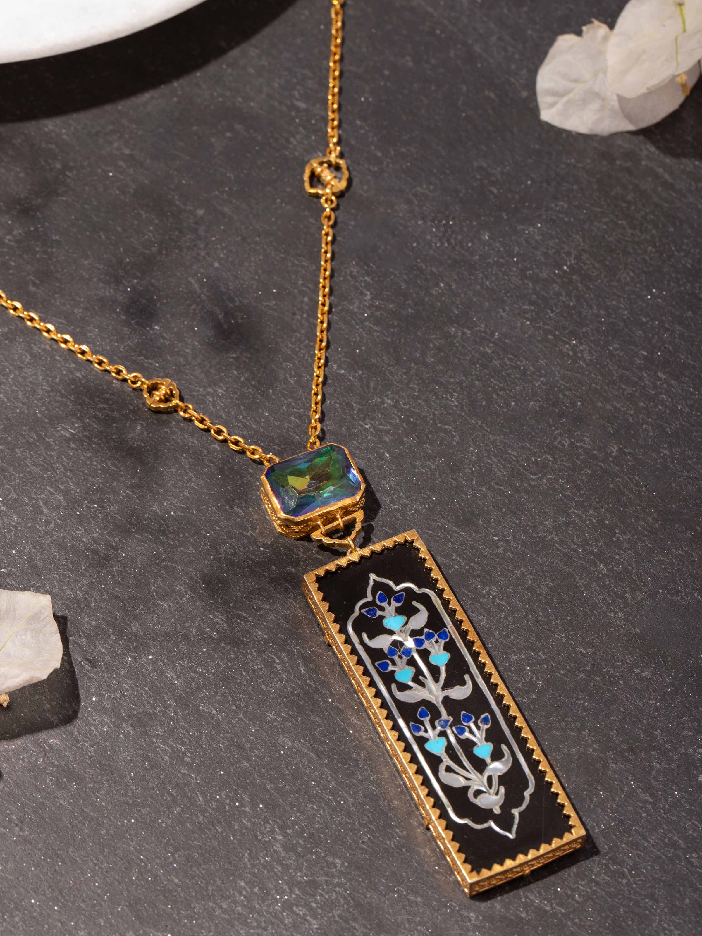 Second lifestyle view of Parchinkari pendant styled with a minimal outfit