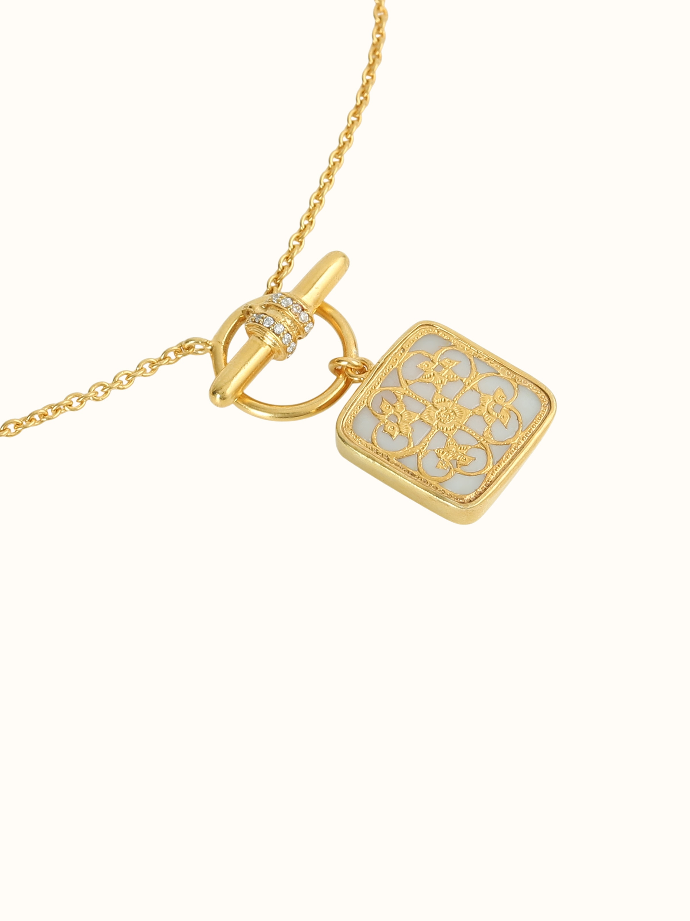 detail view of thewa silver pendant and chain design