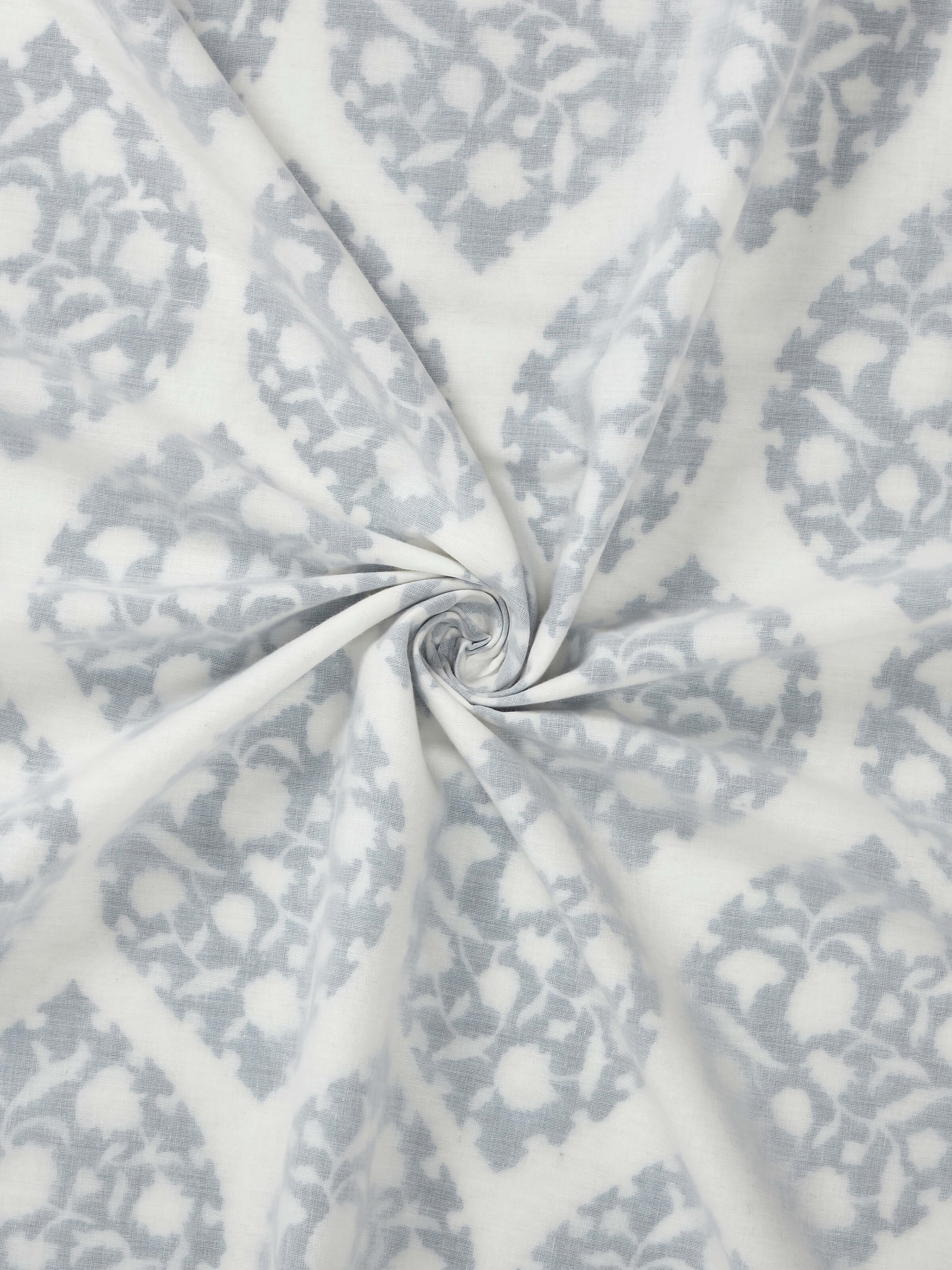 Detailed close-up of ogee block print and soft cotton weave on Mihrab dohar