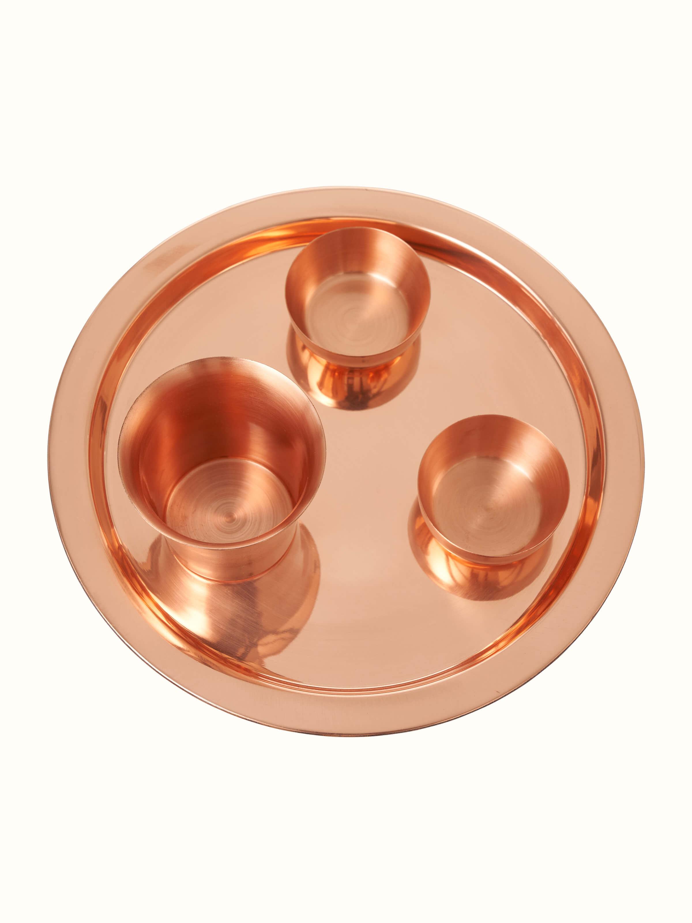 Front view of Polished Copperware Pooja Thali Set (4 pcs) featuring a traditional design