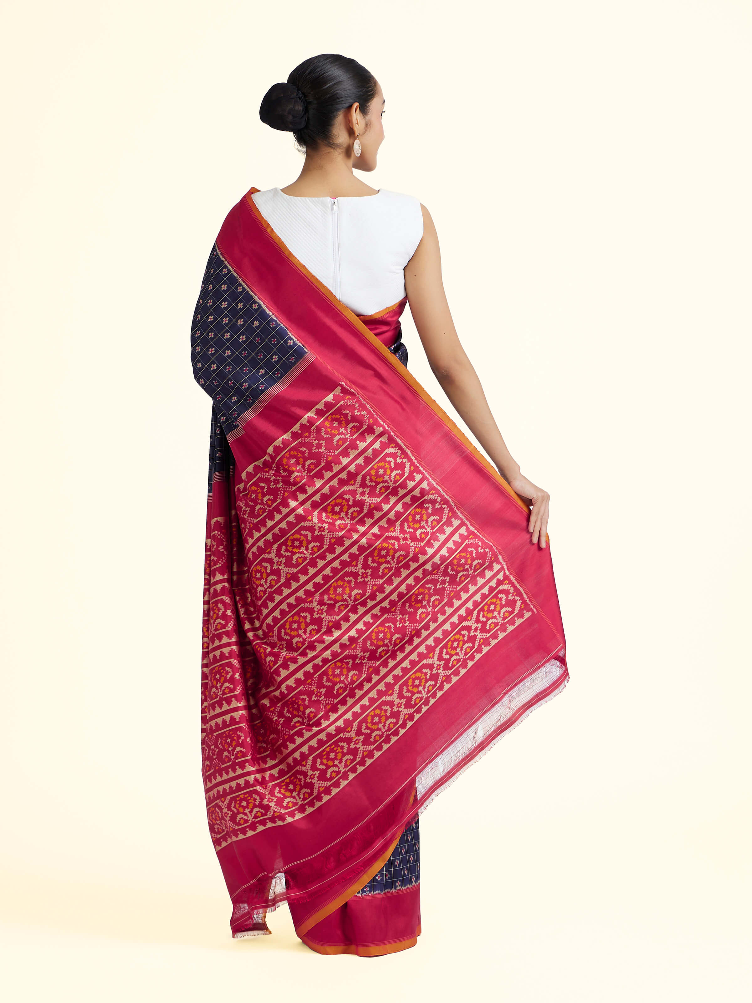Back view of navy mulberry silk Ikat saree displaying pallu and overall design