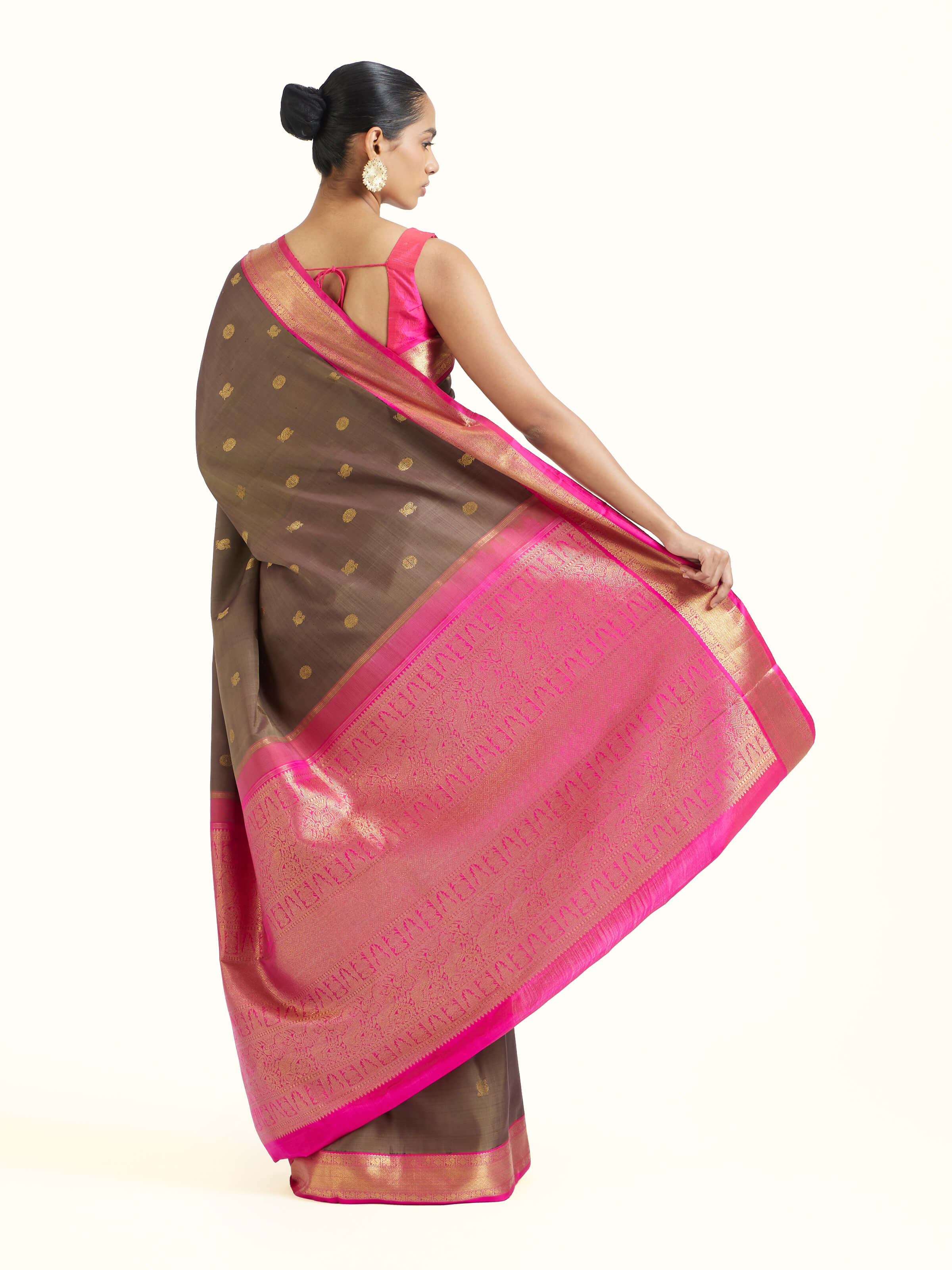 Back view of dark grey silk Kancheepuram saree displaying full pallu design