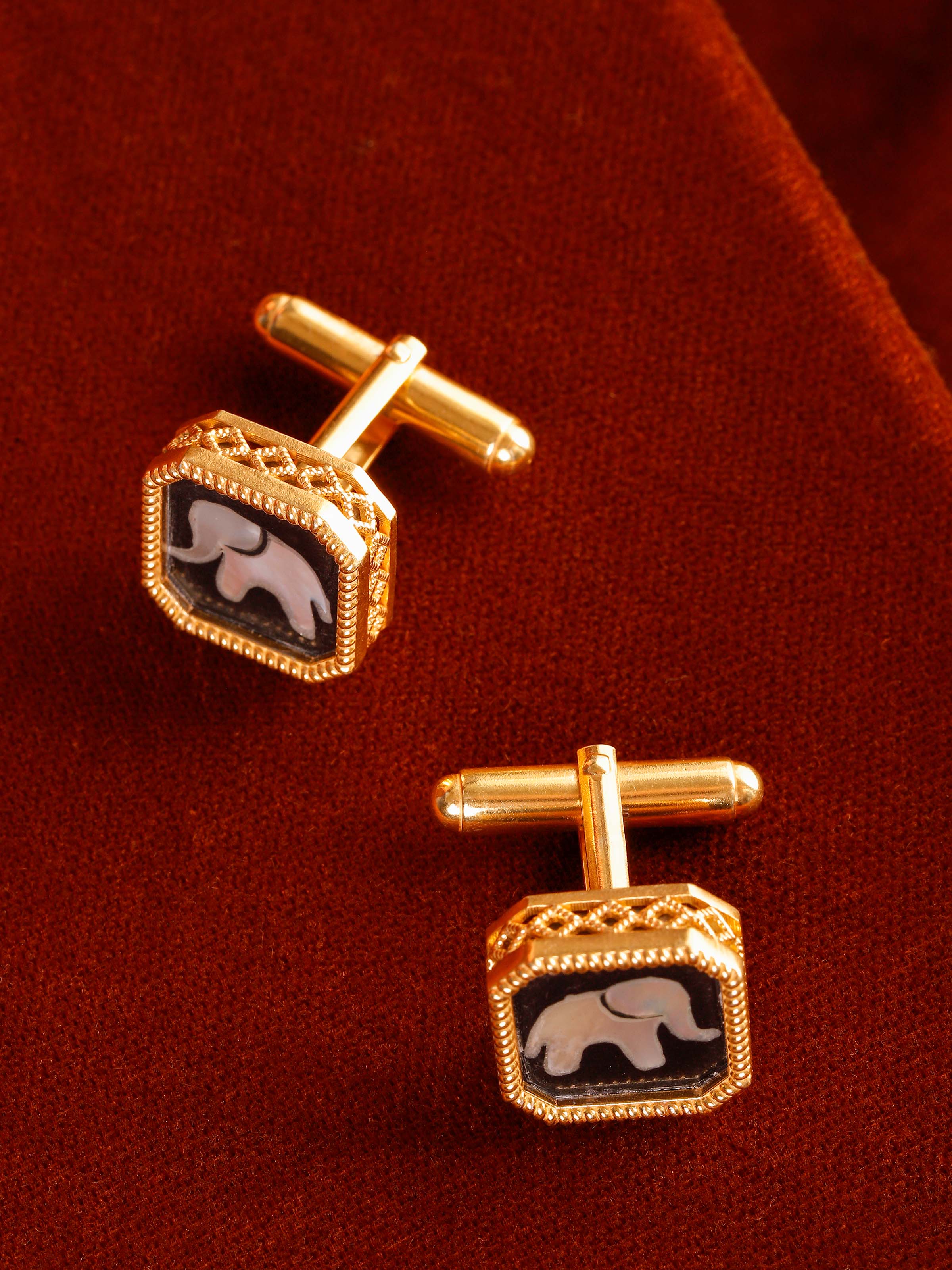 Parchinkari silver cufflinks displayed on shirt cuff – Swadesh