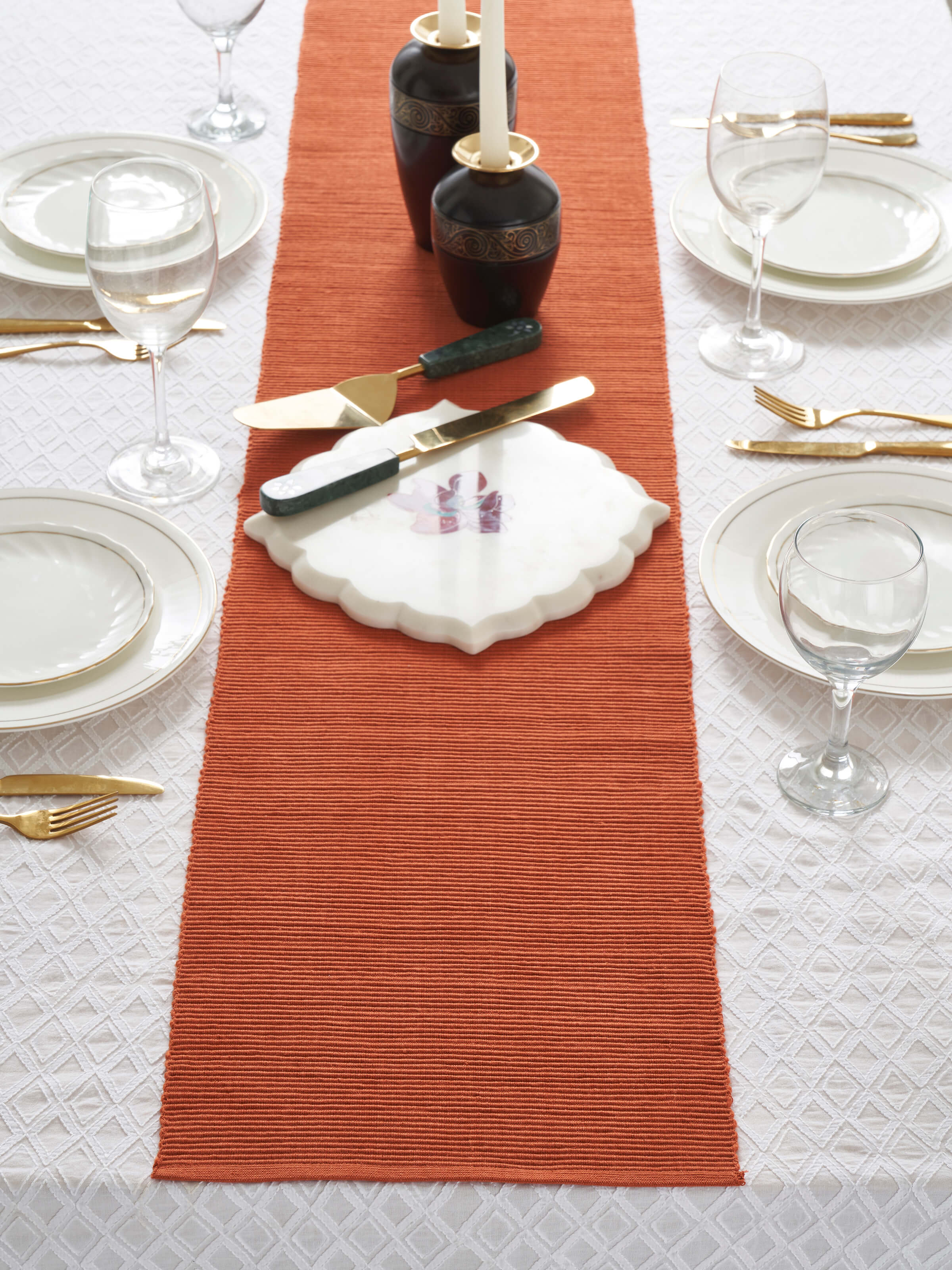 Top-down shot displaying the full length and solid design of the table runner