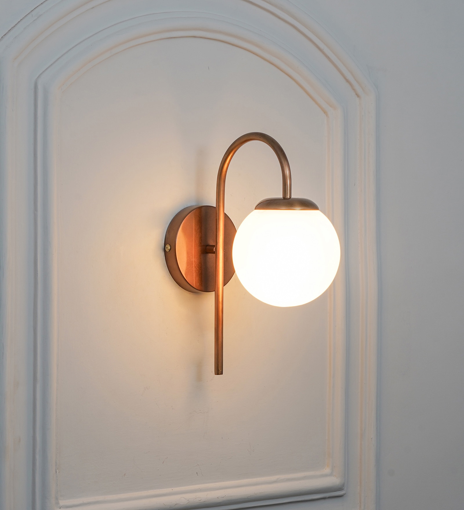 Carter Single Light Wall Fitting In Antique Brass Finish With Opal Frosted White Glass