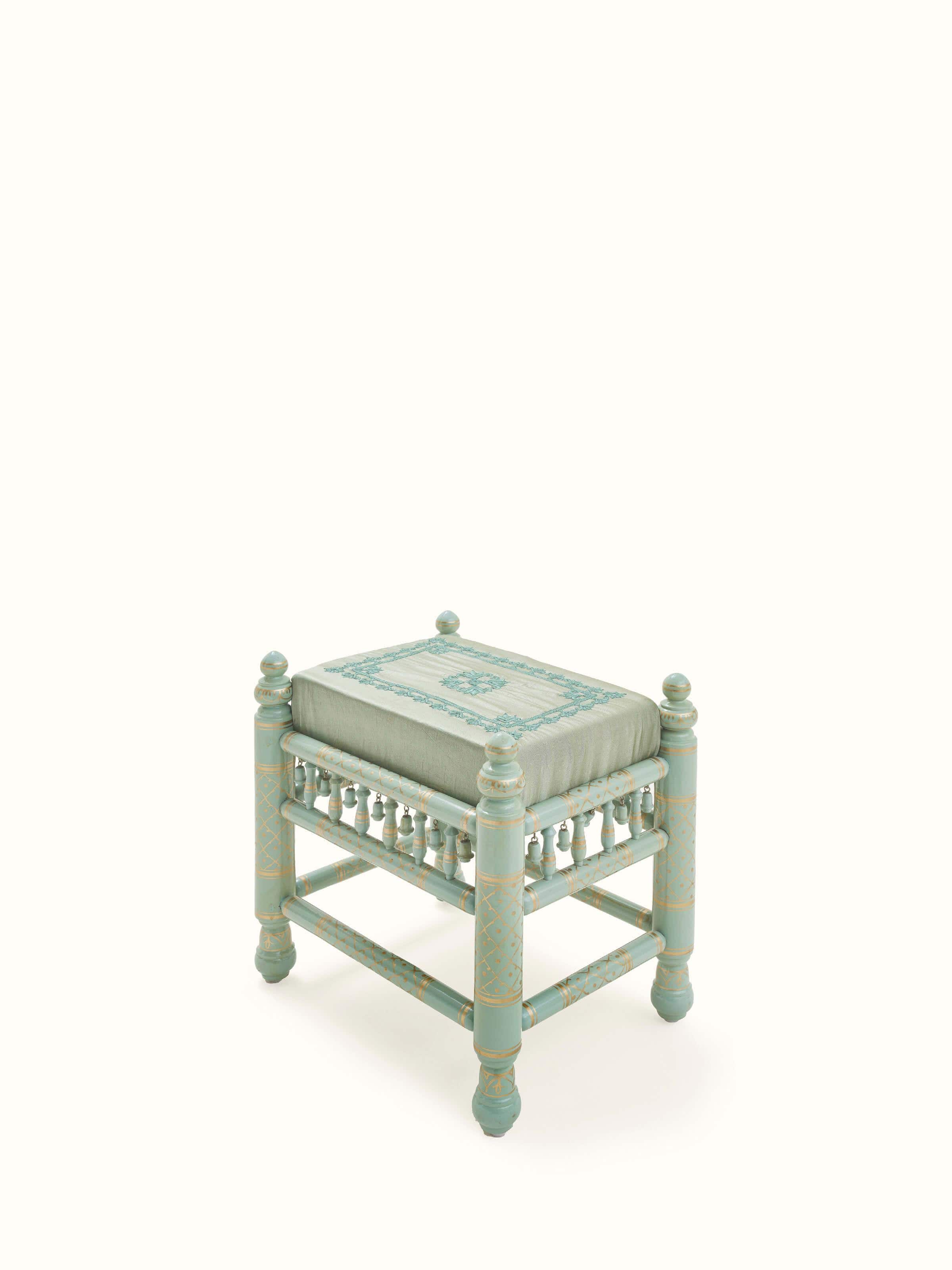 Angled view of Upholstered Teak Wood Sankheda Square Stool showing the detailed upholstery