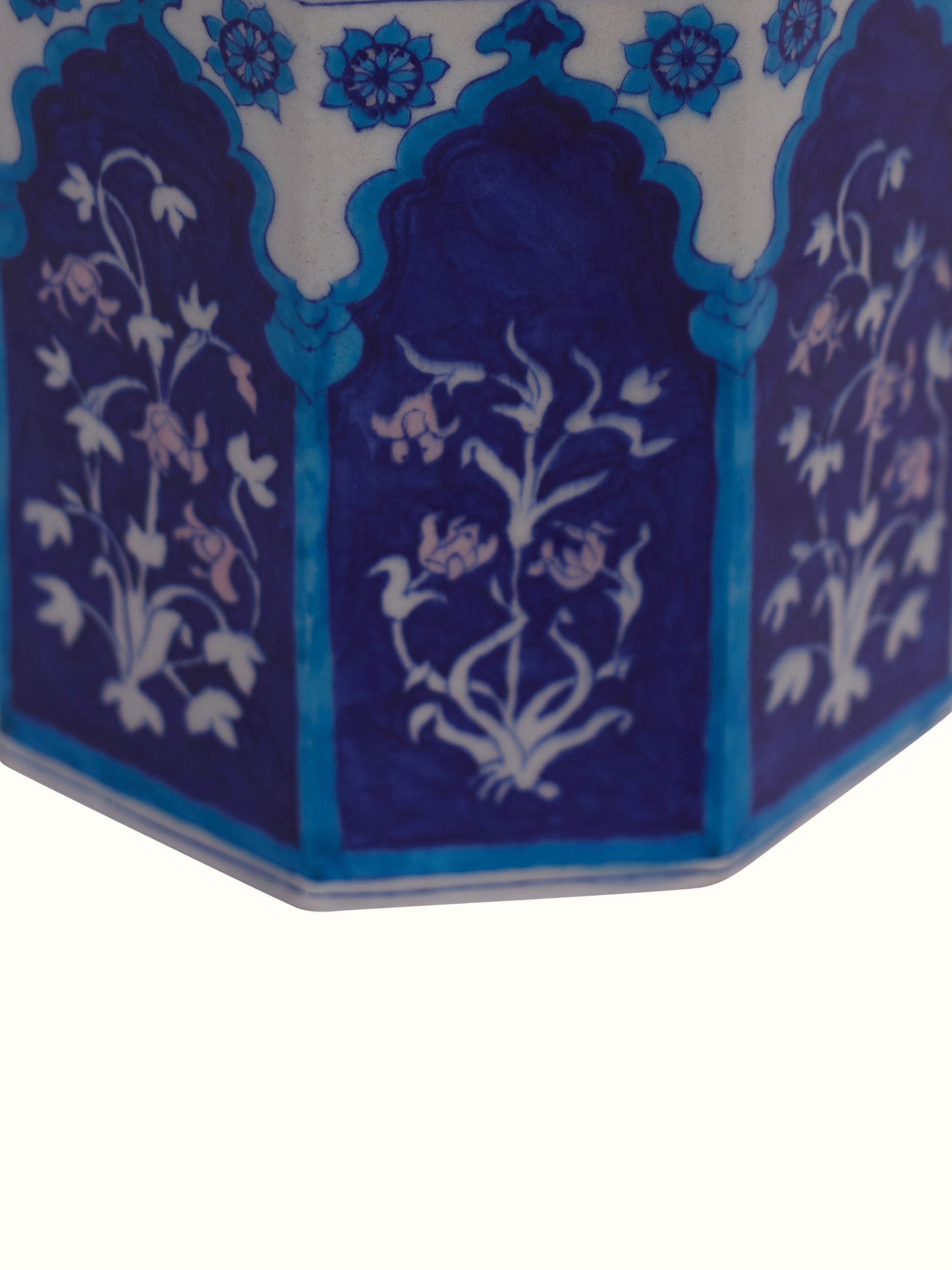 Detail shot of blue pottery baari ceramic planter showing surface texture