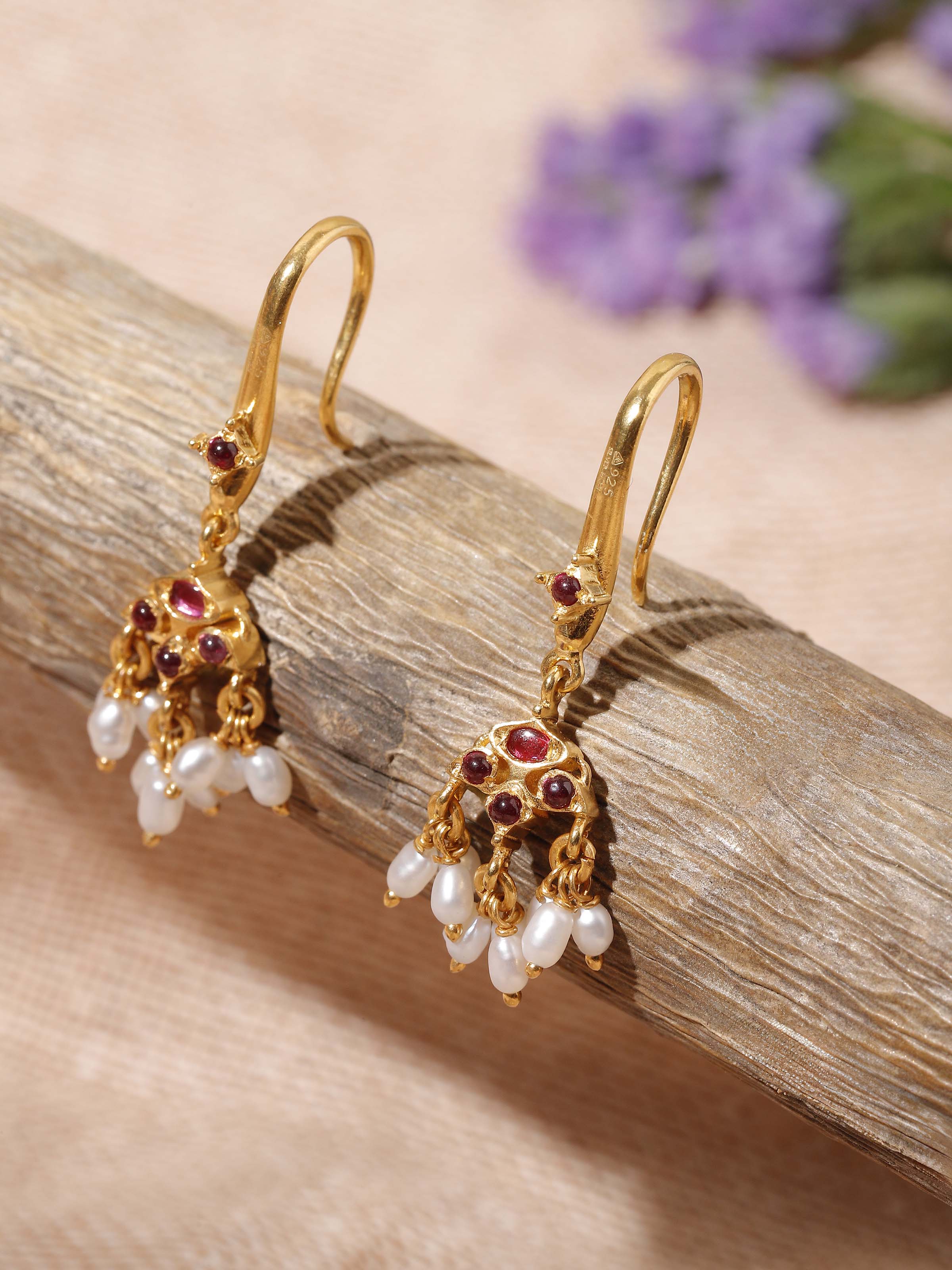 Alternate lifestyle view highlighting the elegant fall and movement of the Guttapusalu Silver Drop Earrings.