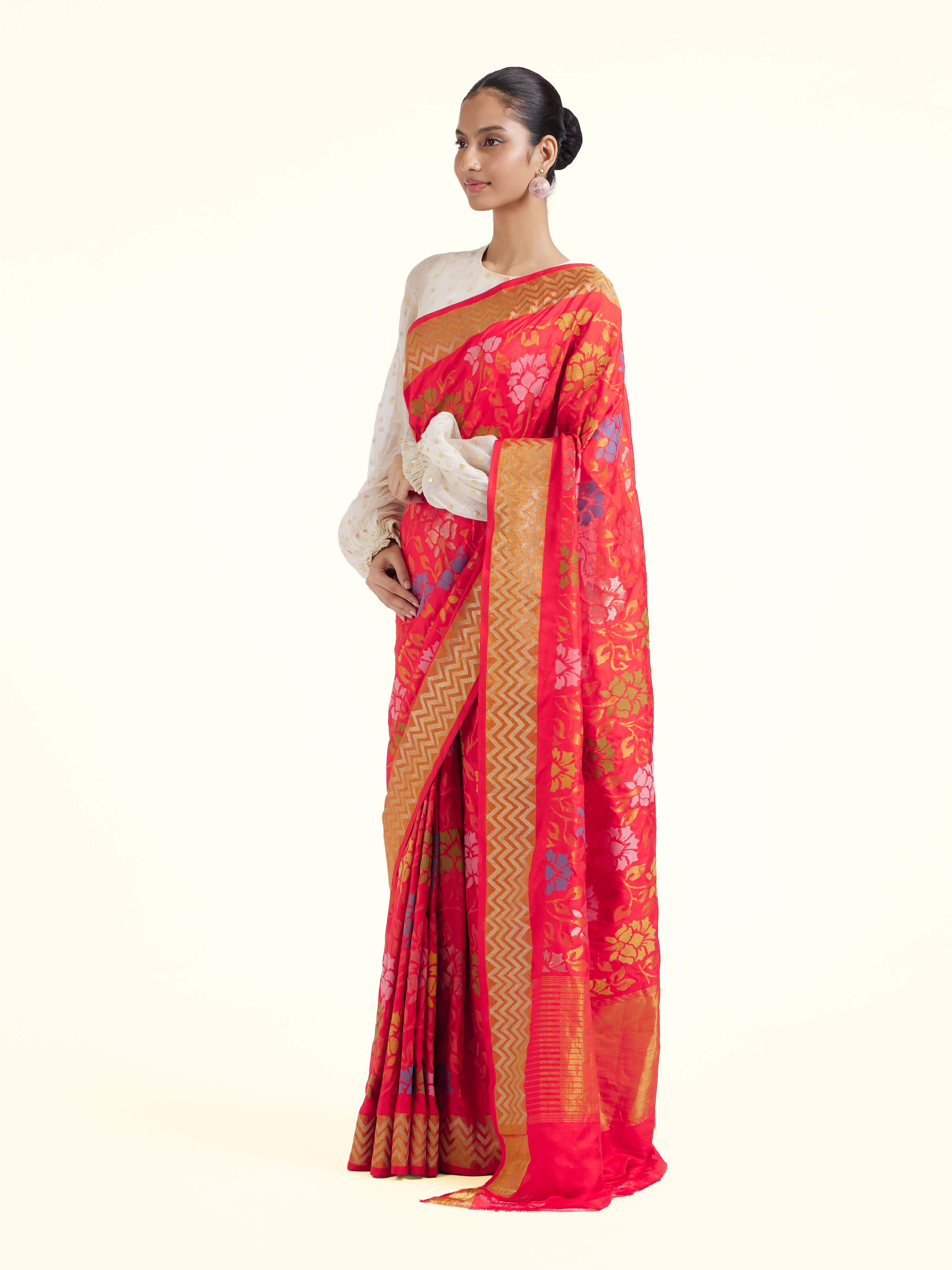 Side view of red mulberry silk Uppada Jamdani saree highlighting silk drape