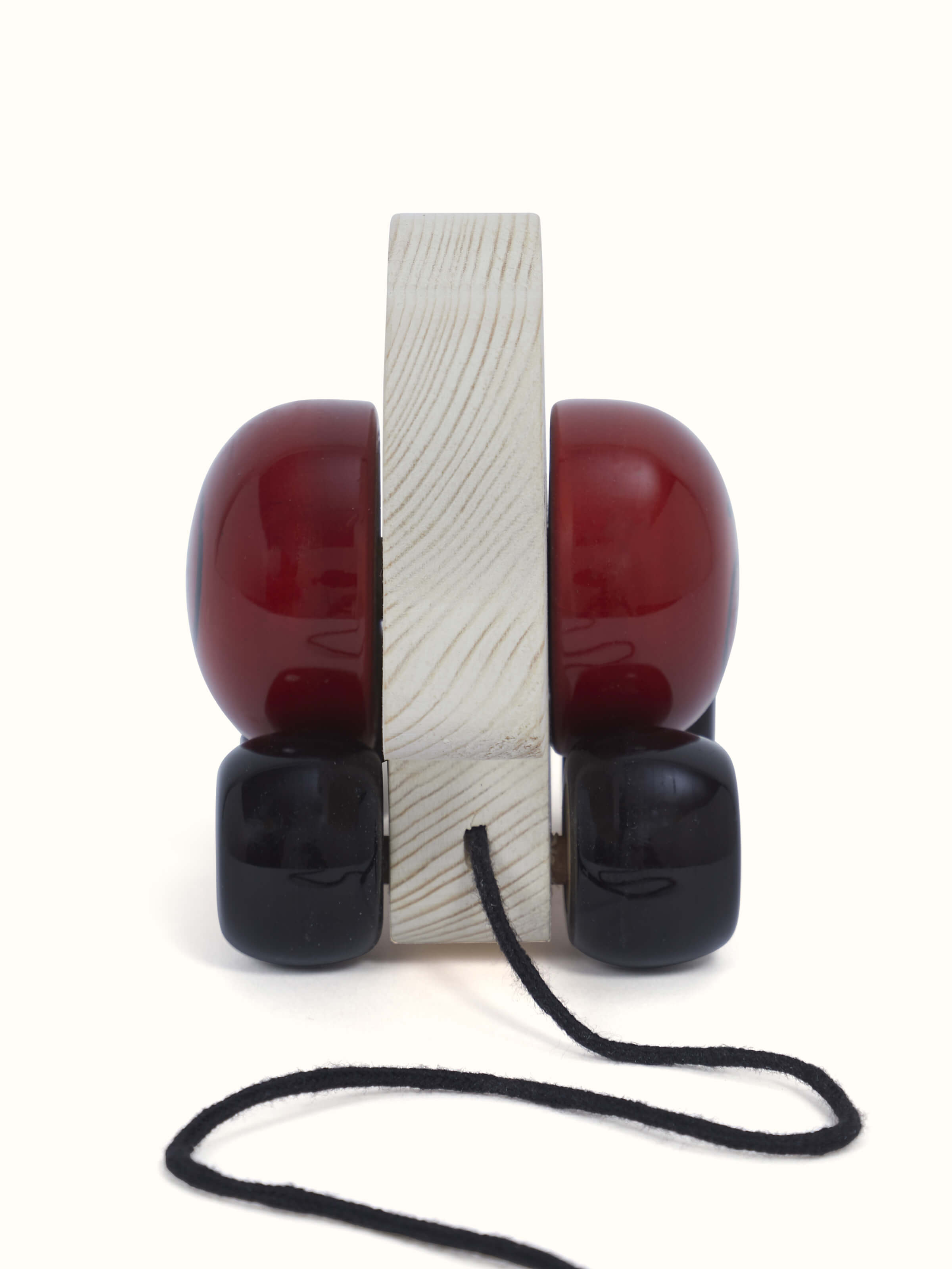 Angled view of Channapatna Wooden Elifa Toy showcasing its detailed design and vibrant colors.