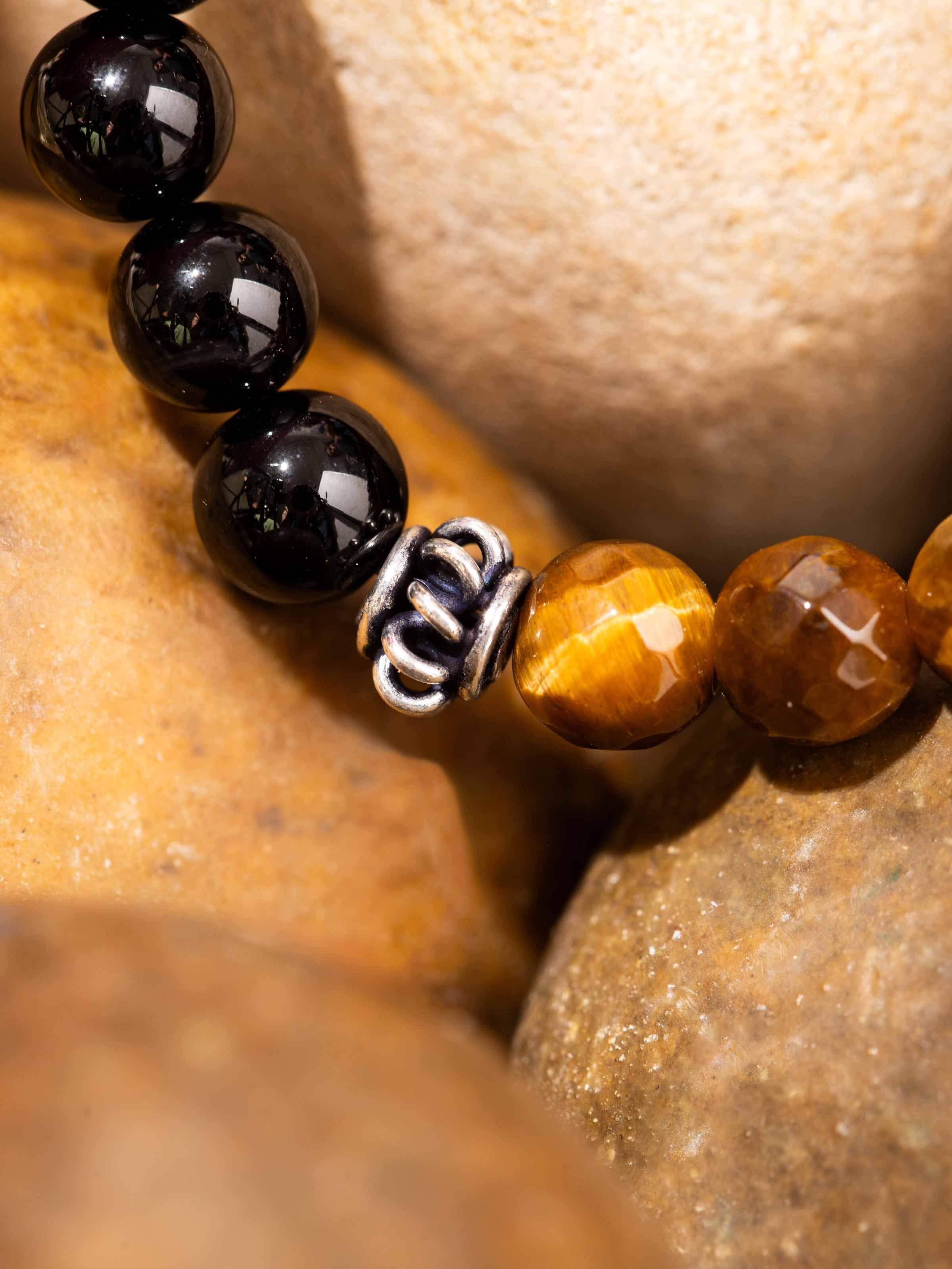 Detailed display angle of Tiger Eye, Onyx & Moonstone Bracelet emphasizing natural textures and silverwork