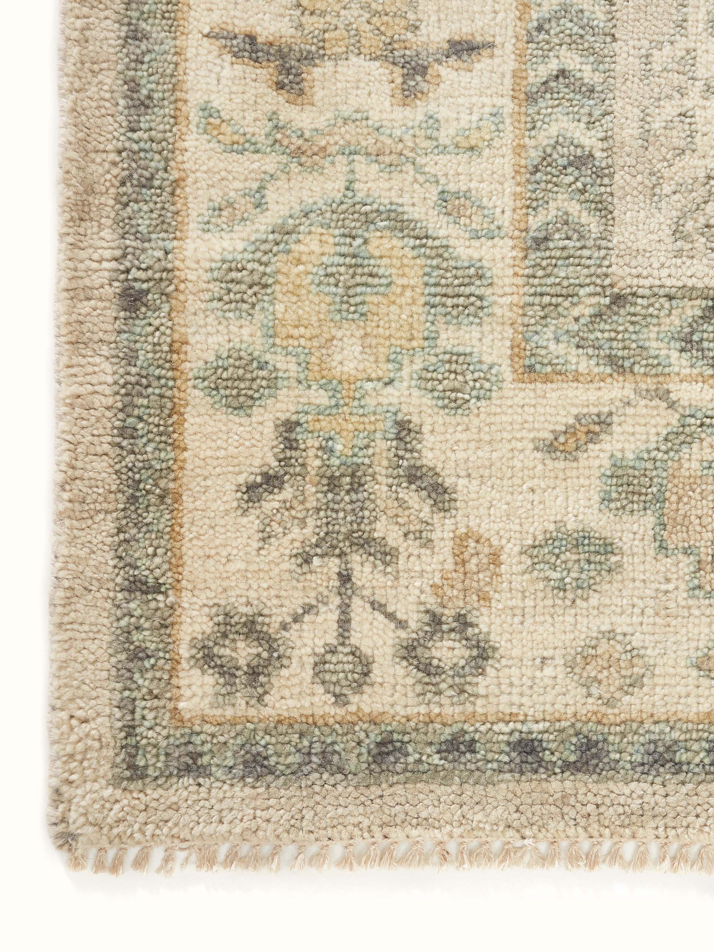 Detailed shot focusing on the texture and precision of the hand-knotted wool fibers