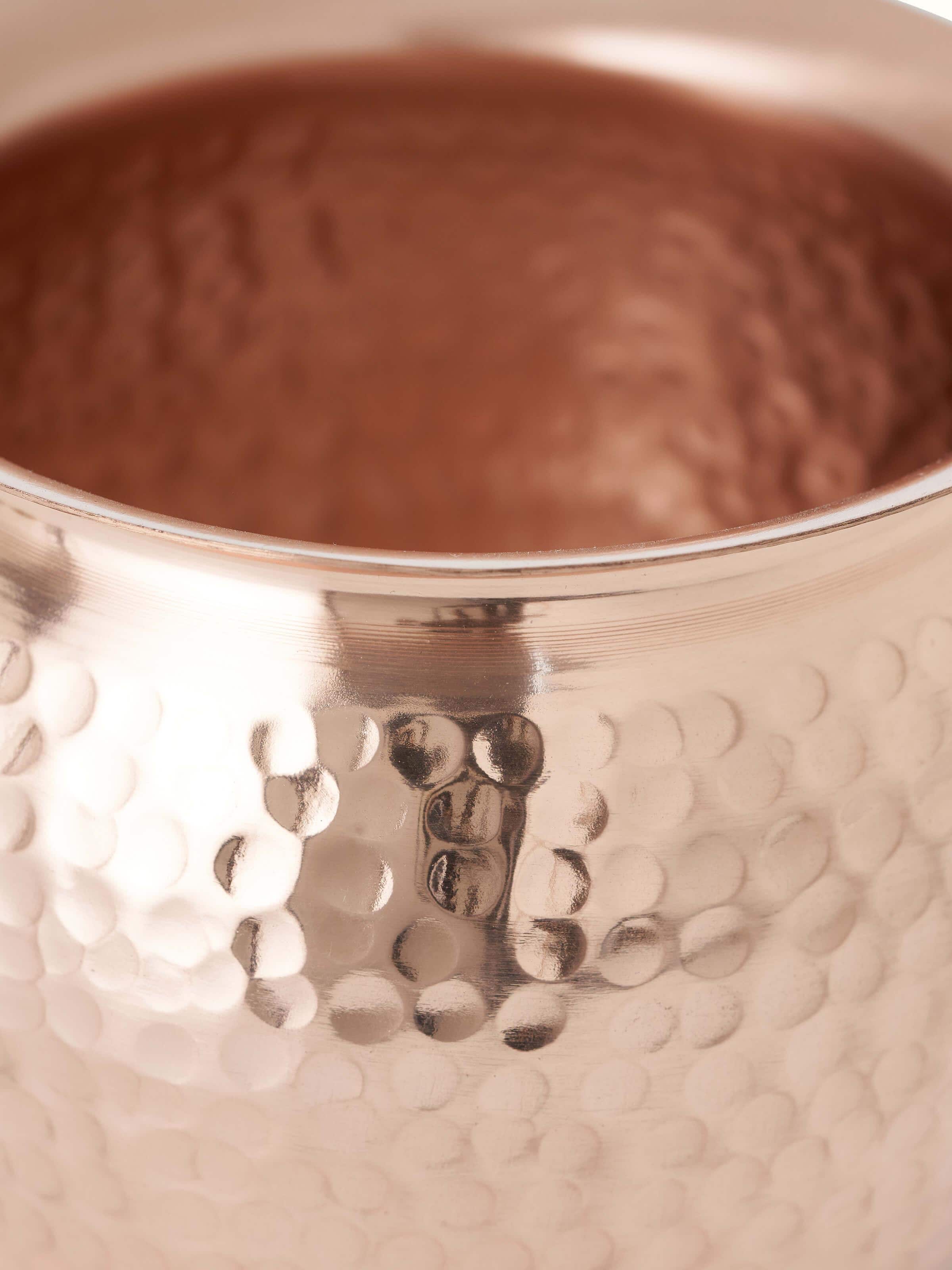 Detailed view of Polished copperware kalash