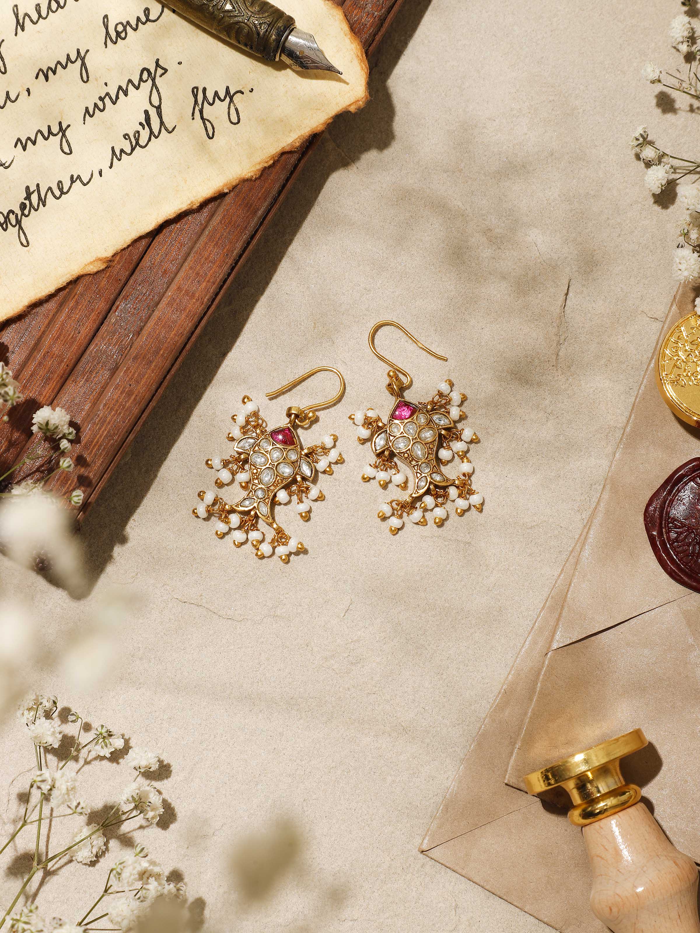 Another angled perspective capturing the balance and symmetry of the silver drops