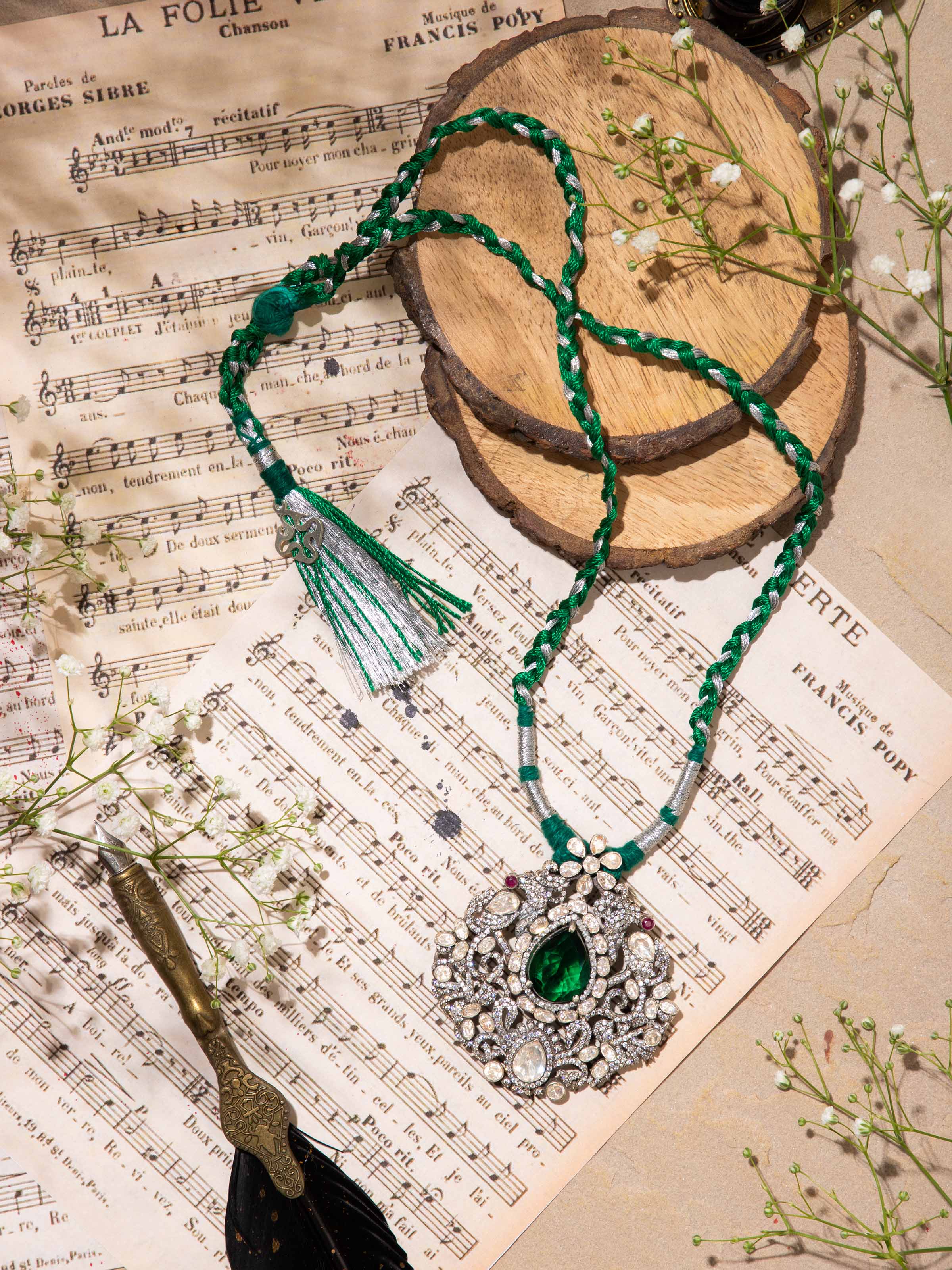 Close-up highlighting the detailed smithing work on the necklace