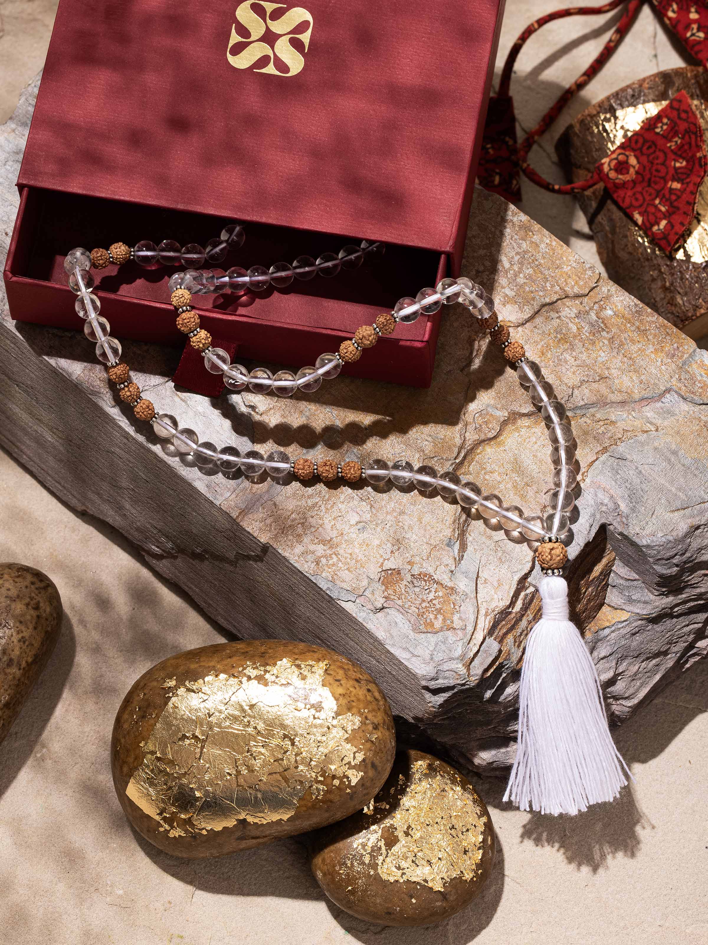 Side view of Rudraksha & Sphatik Silver Mala, showcasing the alternating Rudraksha and sphatik beads