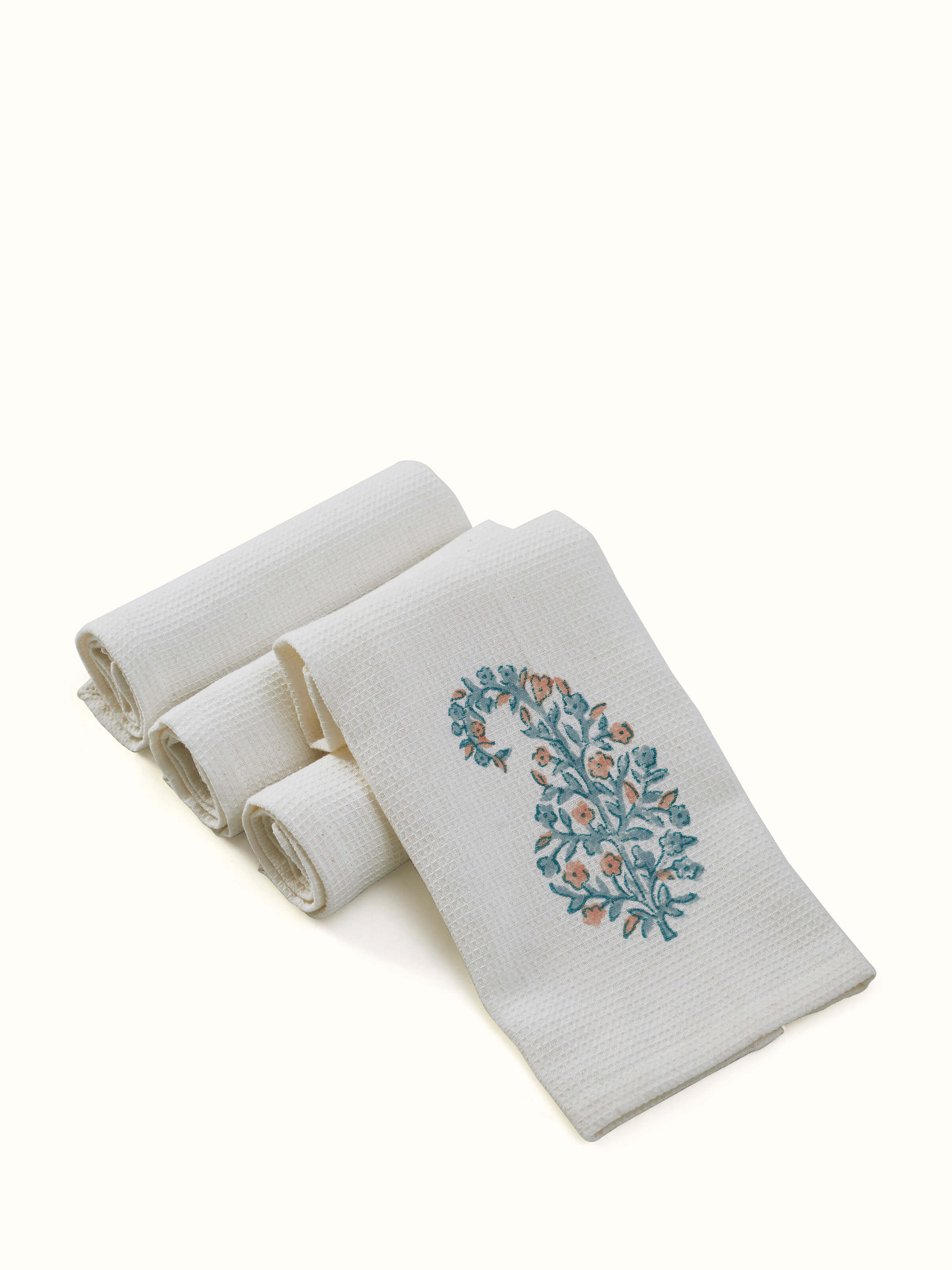 Close-up view of Ambi buta blue floral cotton Sanganeri block printed face towels showing detailed floral patterns and texture