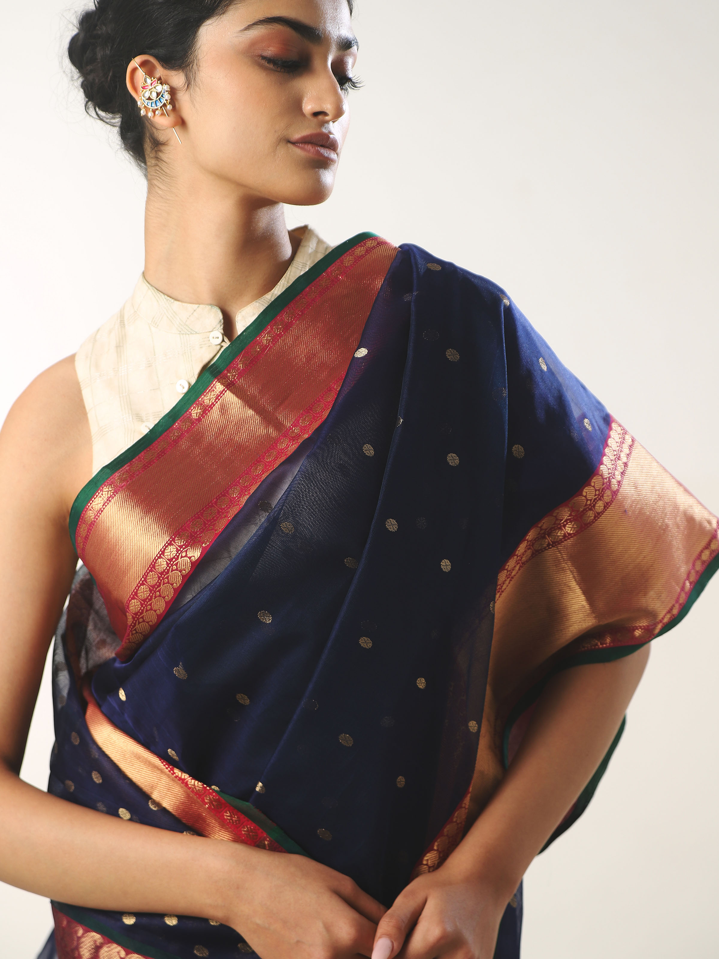 Close-up angled view of blue cotton silk Chanderi saree showcasing motif details