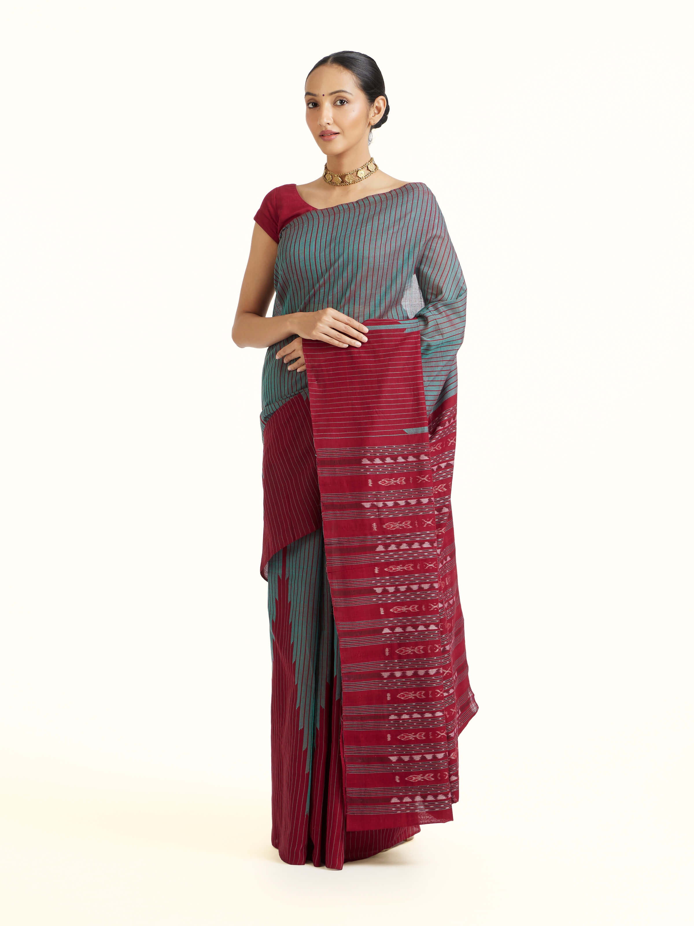 Side view of Green Cotton Bandha Odisha Ikat Saree highlighting the detailed craftsmanship and elegant silhouette