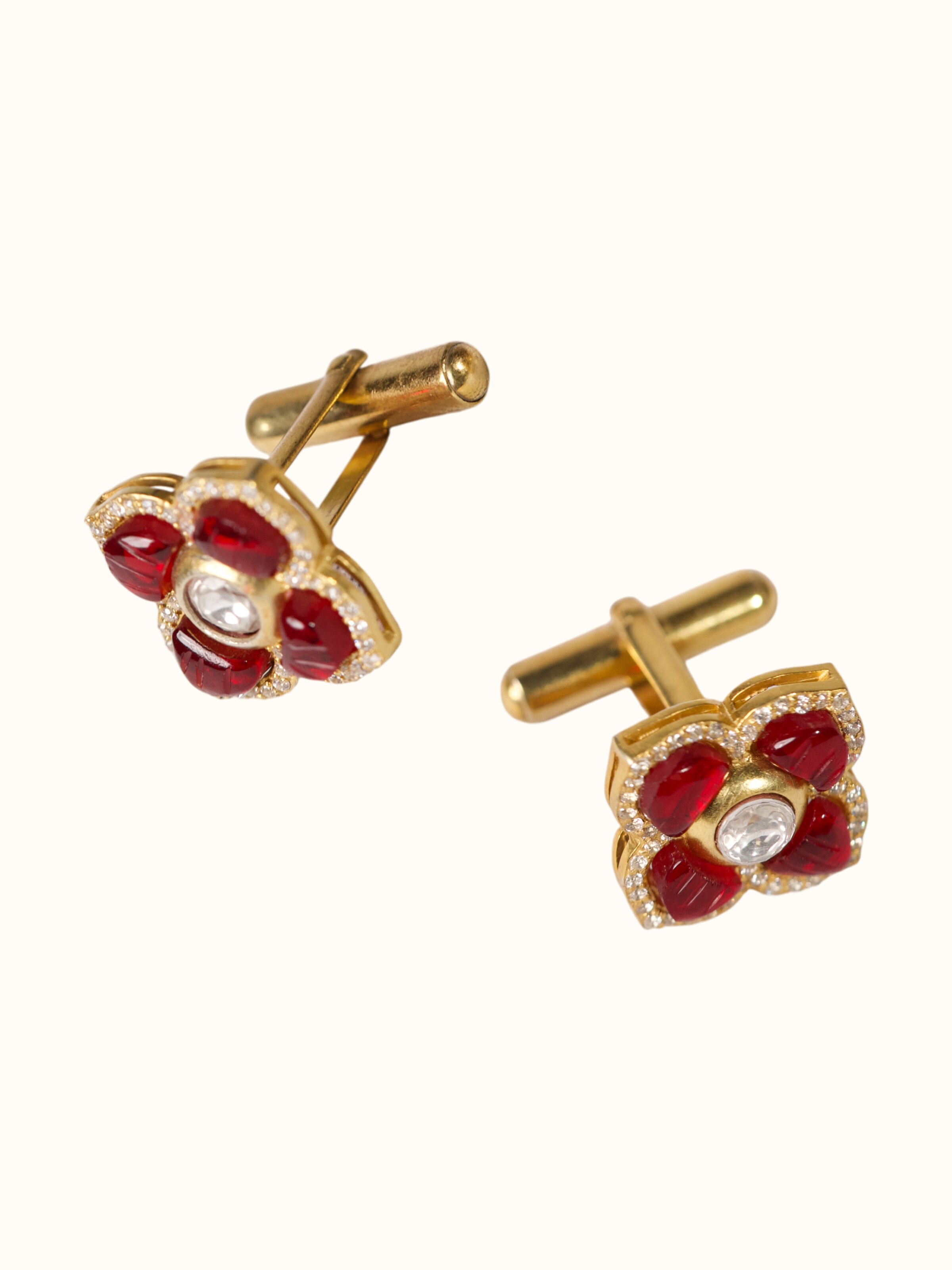 angled view of silver smithing gold plated cufflinks set